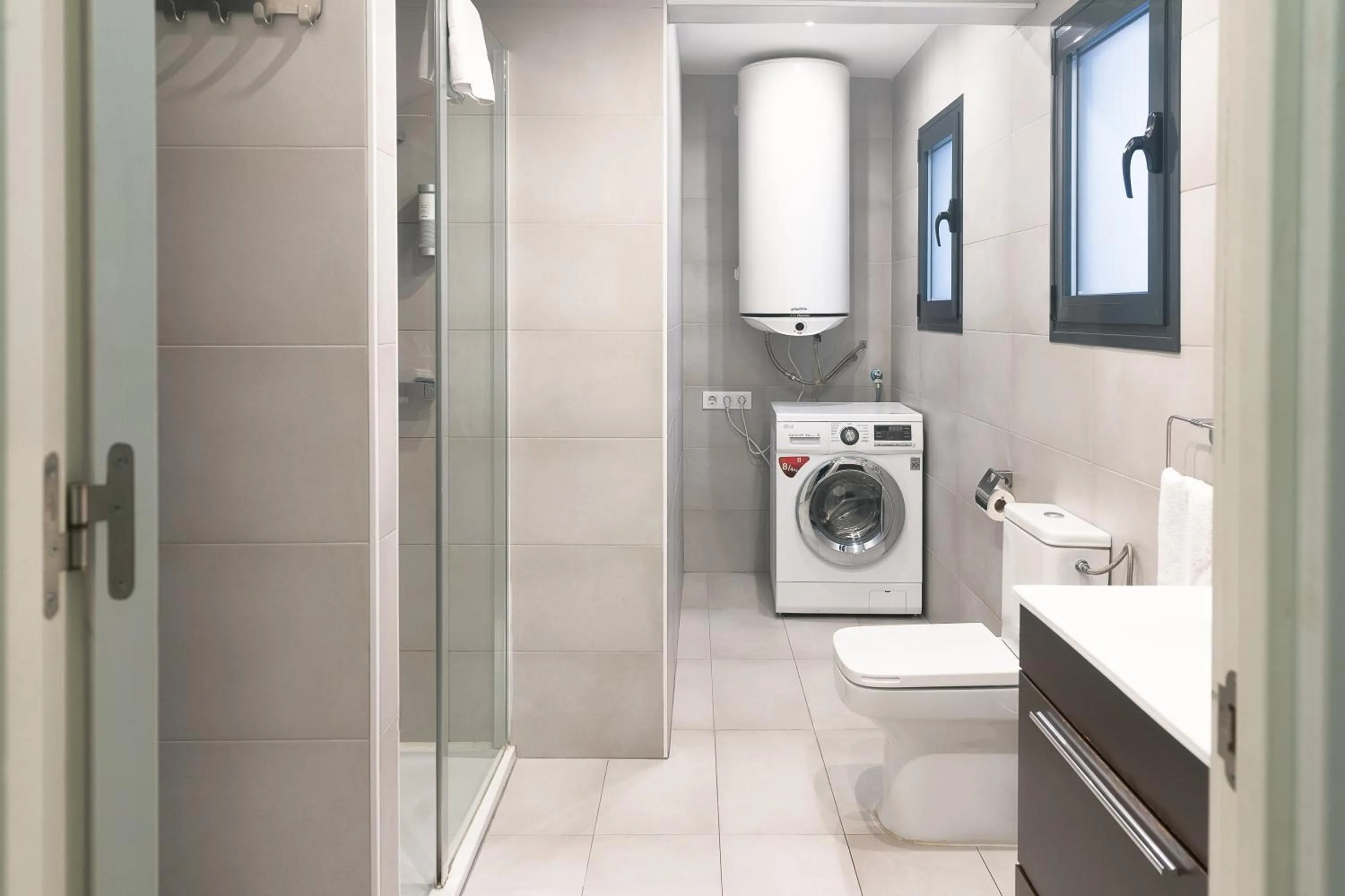 Bathroom in Modern Catalan Apartments by Olala Homes