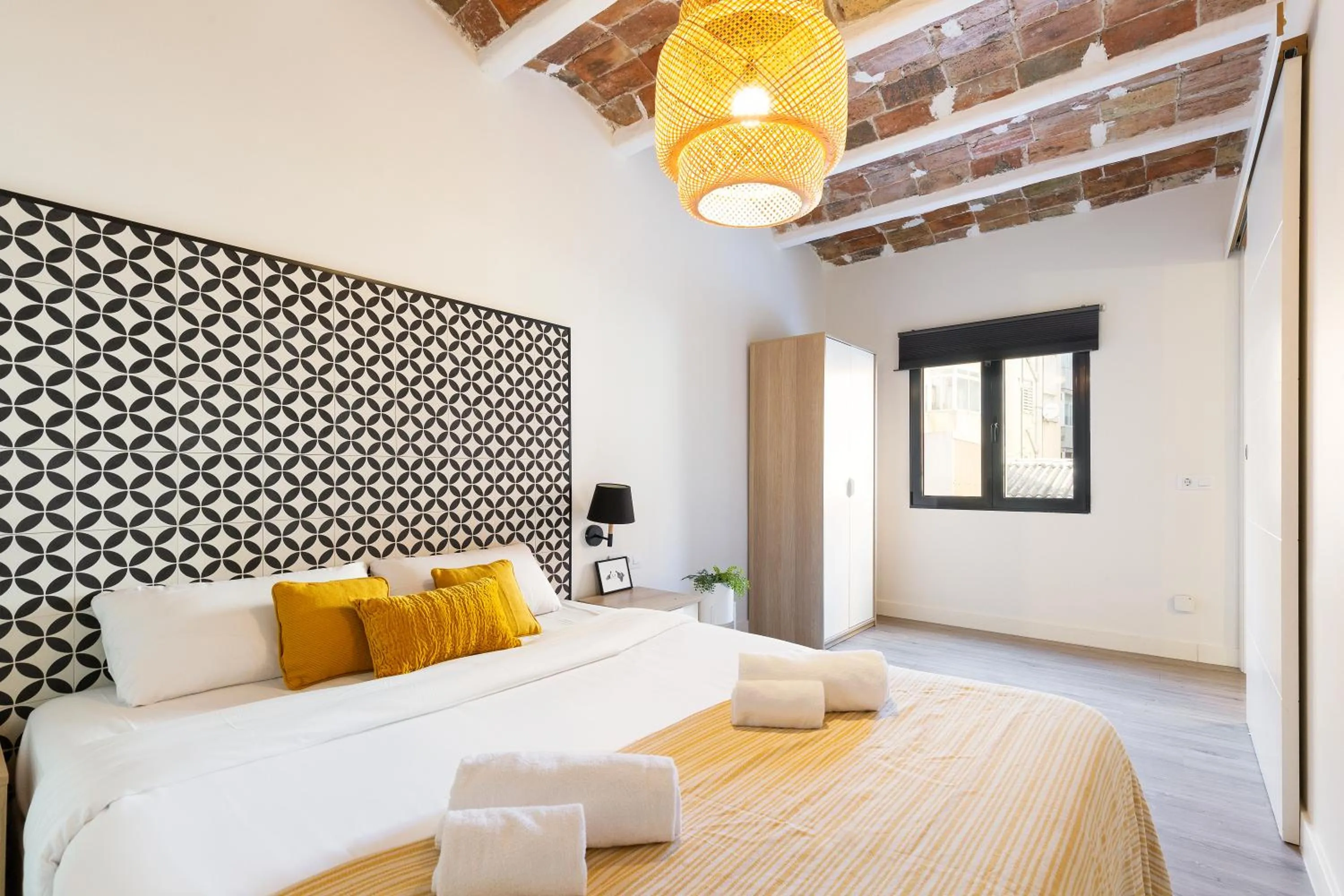 Bed in Modern Catalan Apartments by Olala Homes
