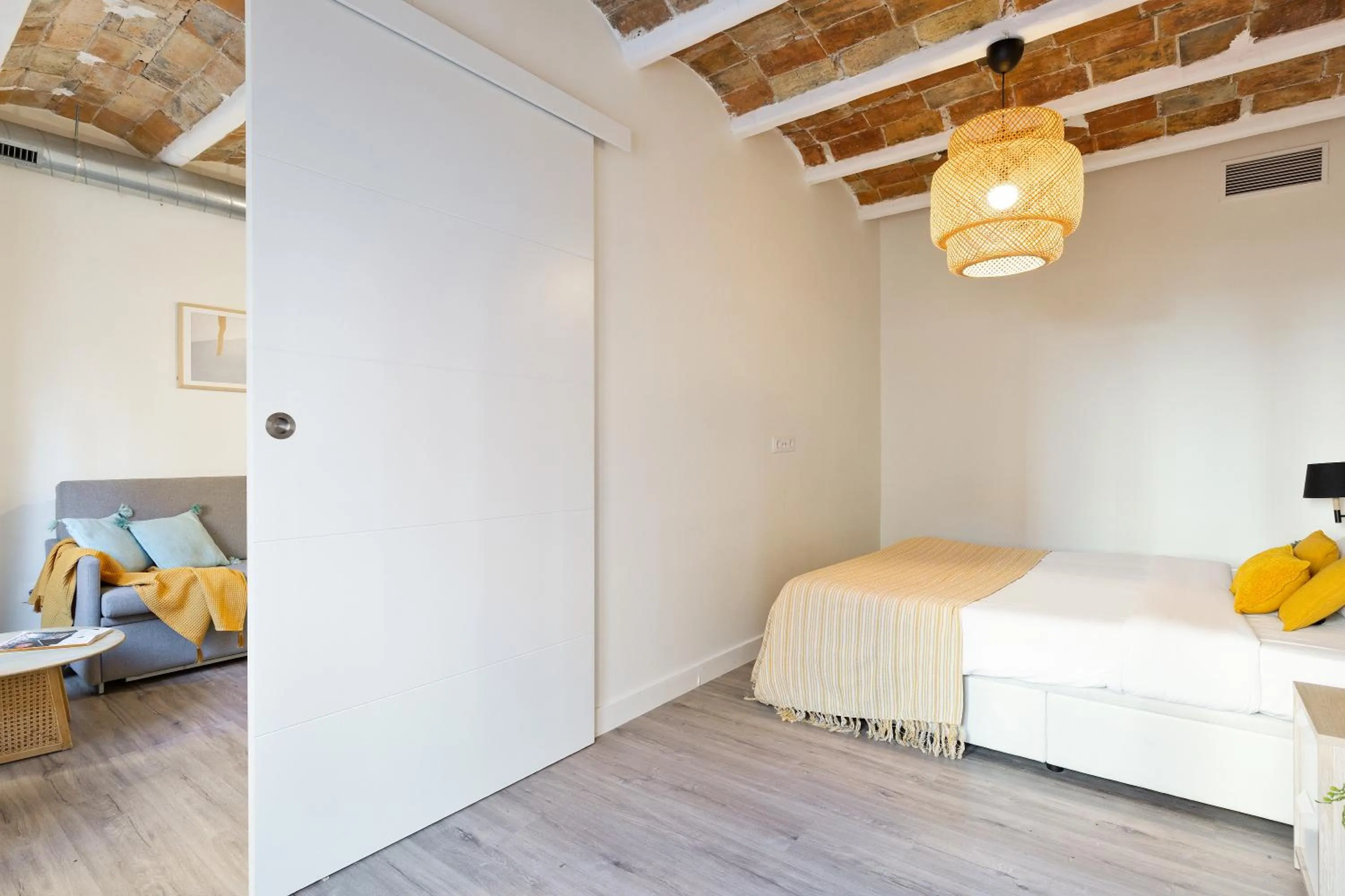 Bed in Modern Catalan Apartments by Olala Homes