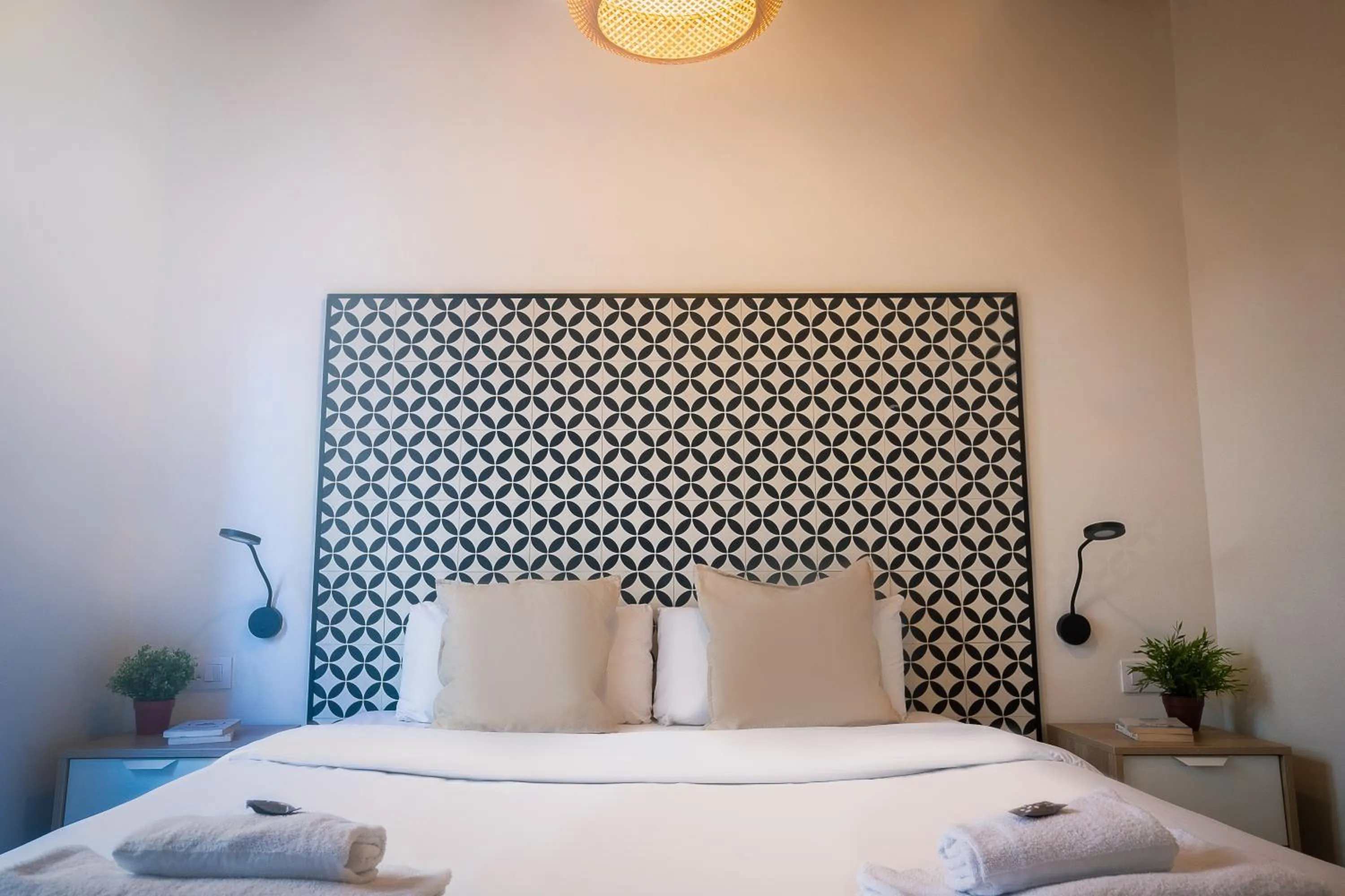 Bed in Modern Catalan Apartments by Olala Homes