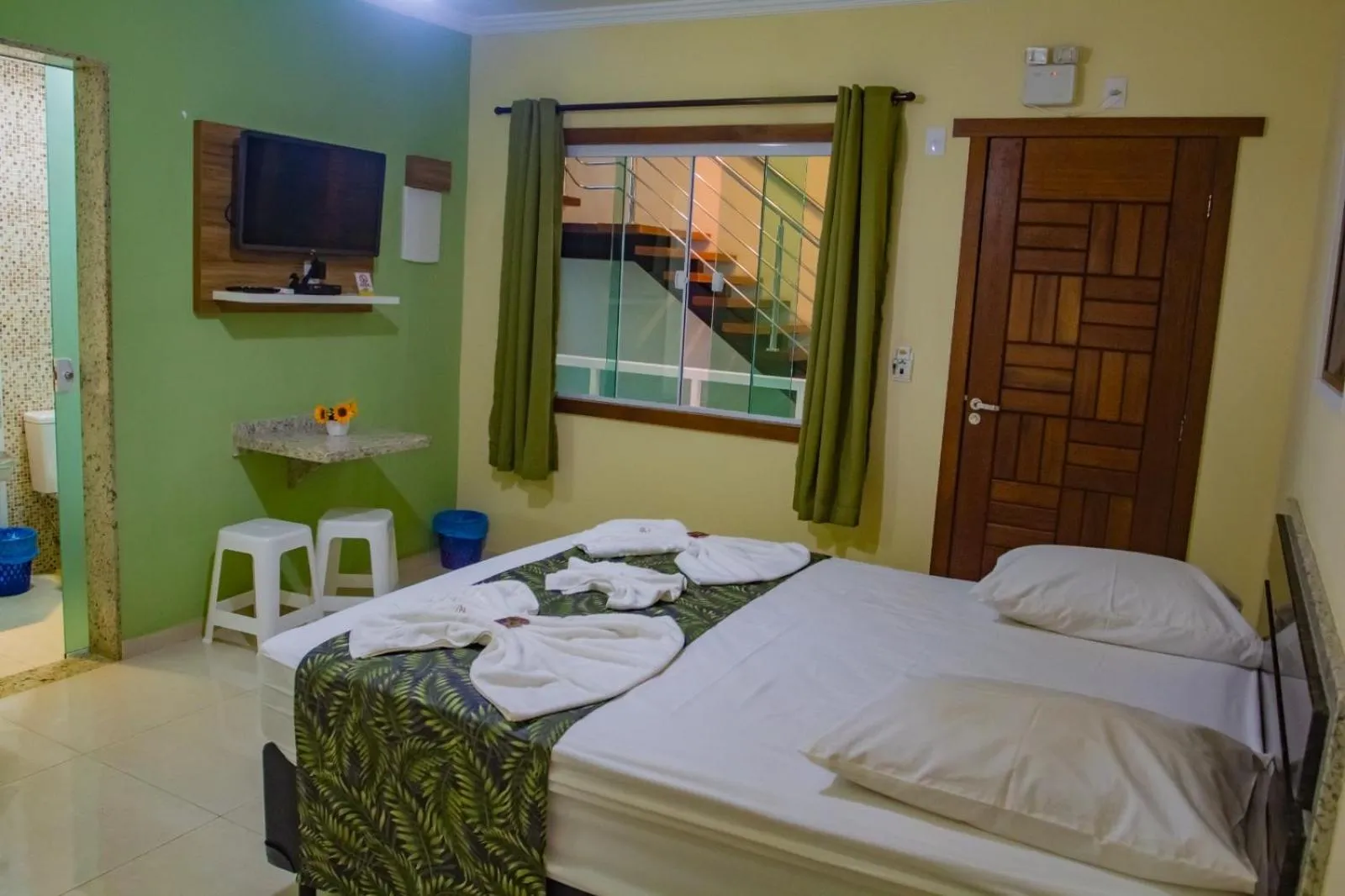 Bed in Pousada Palmares