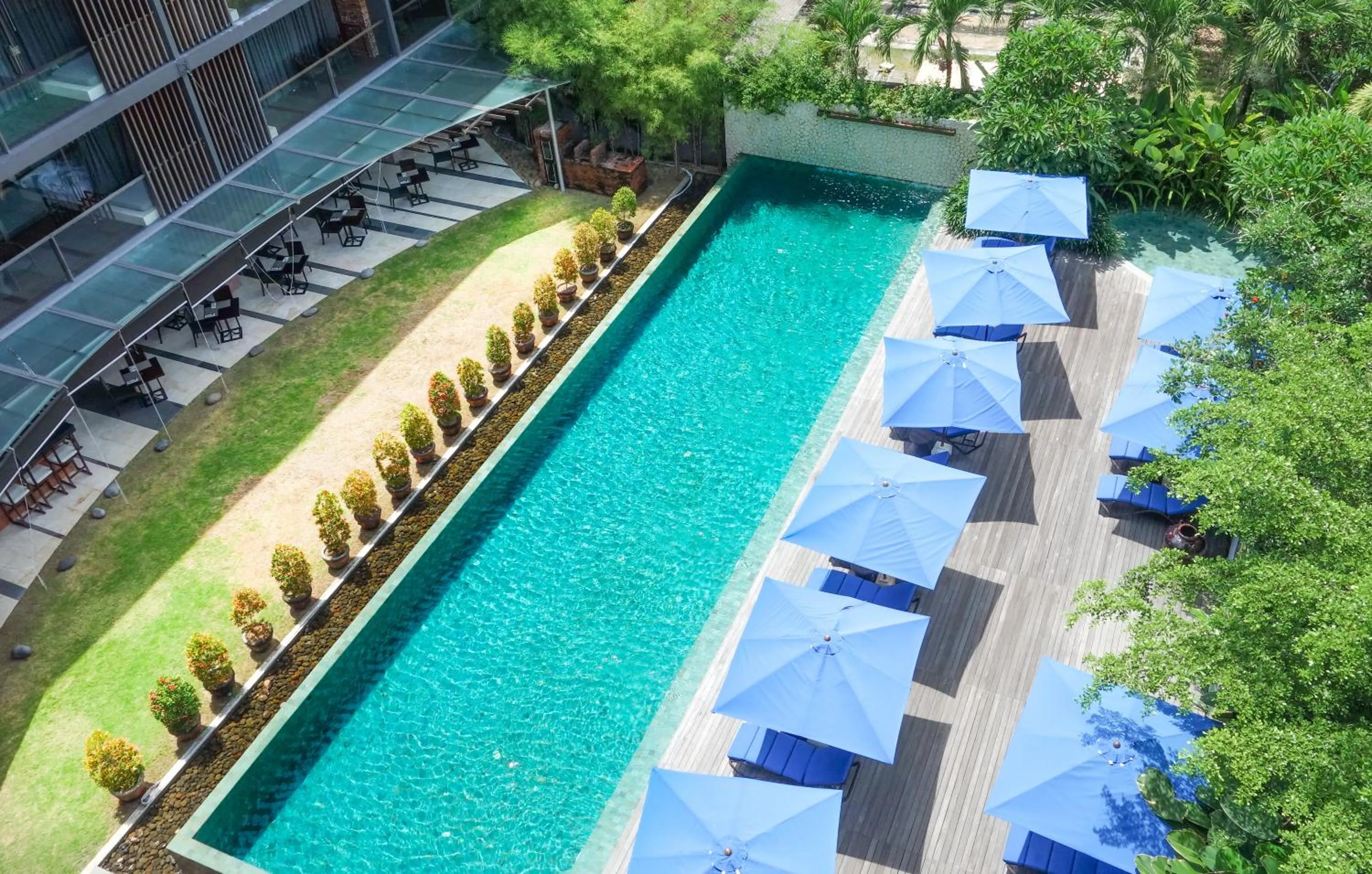 Swimming pool in Suites by Watermark Hotel and Spa