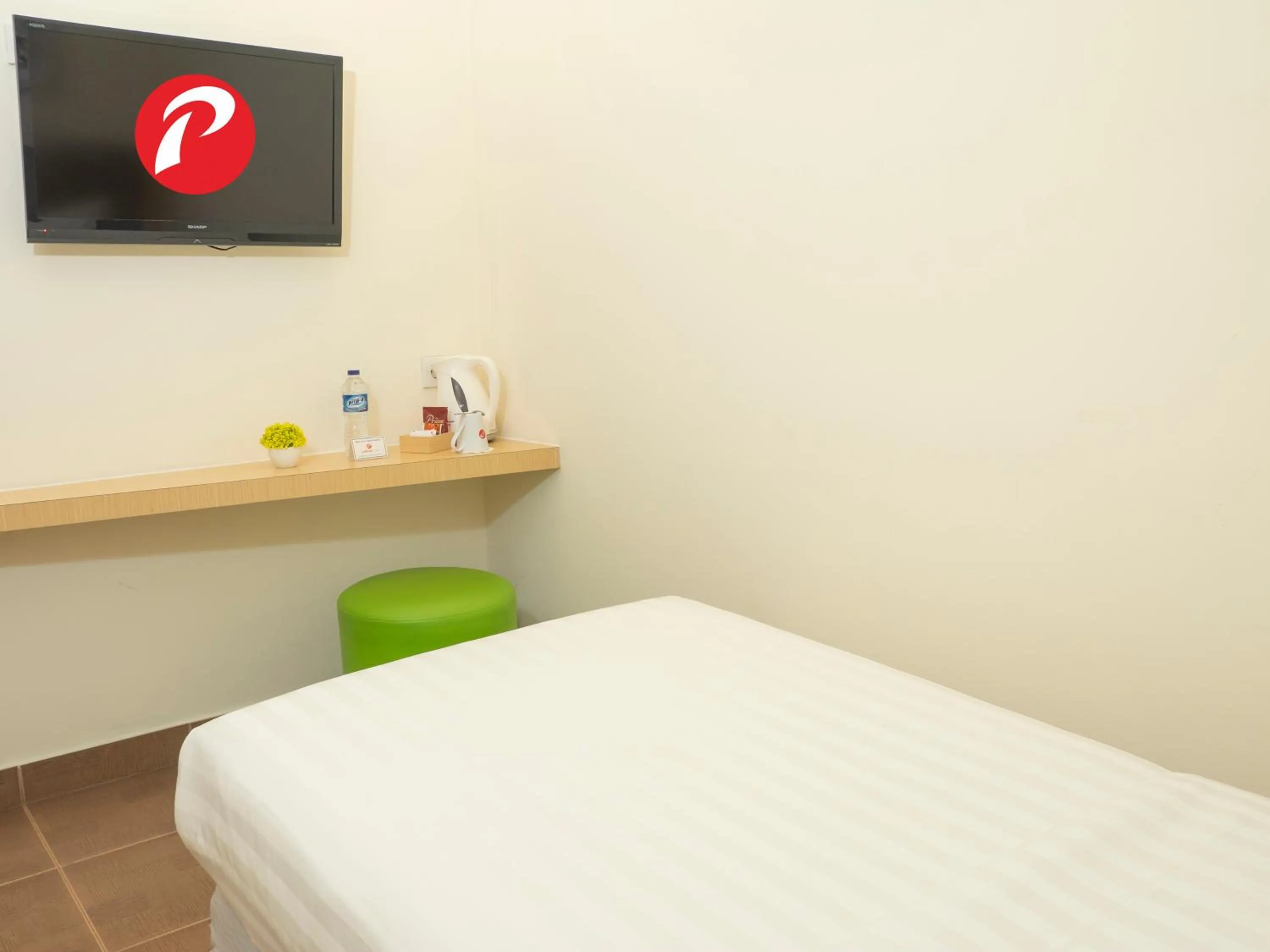 Bed in d'primahotel Airport Jakarta Terminal 1A