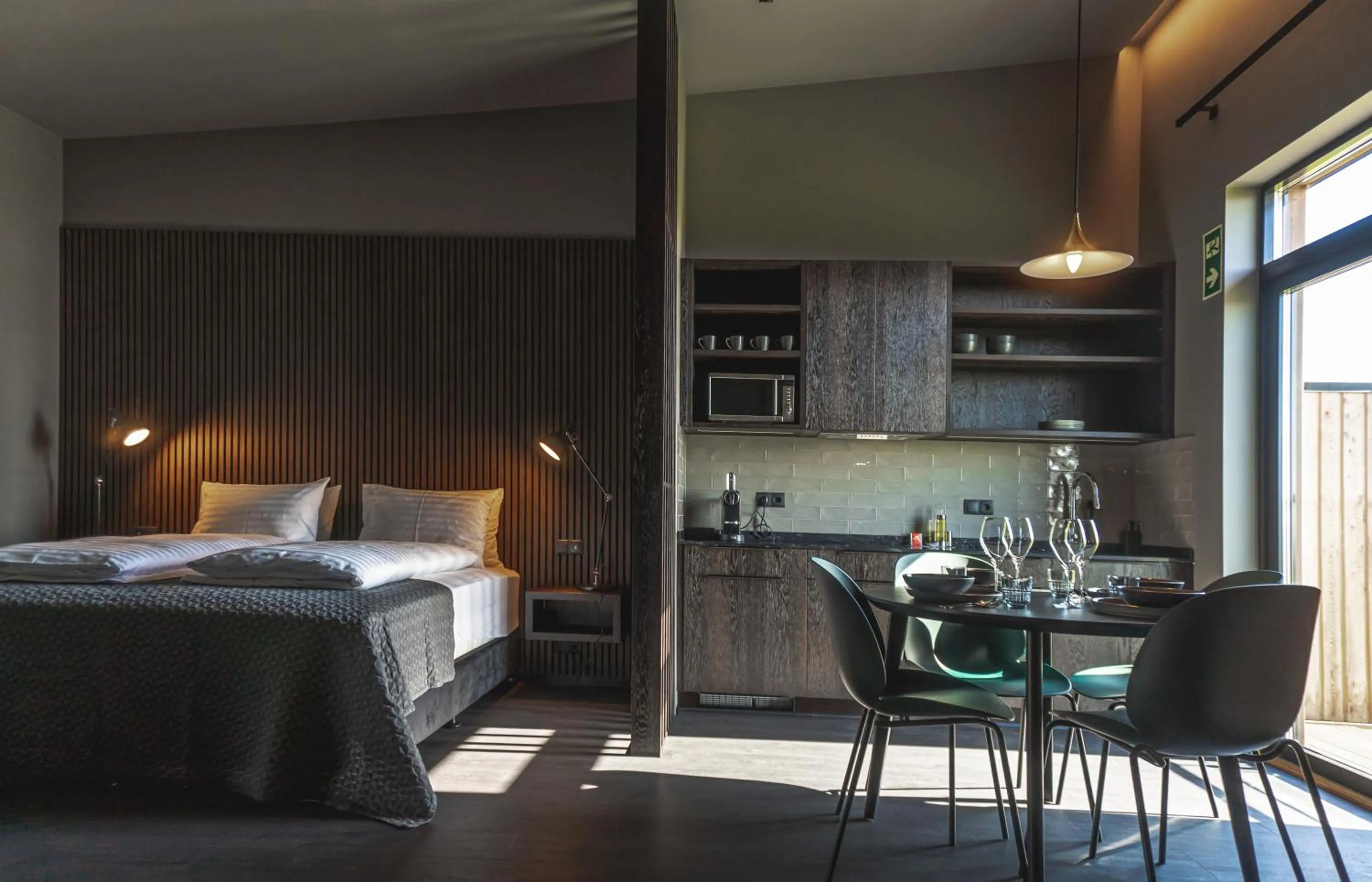 Bed in Black Beach Suites