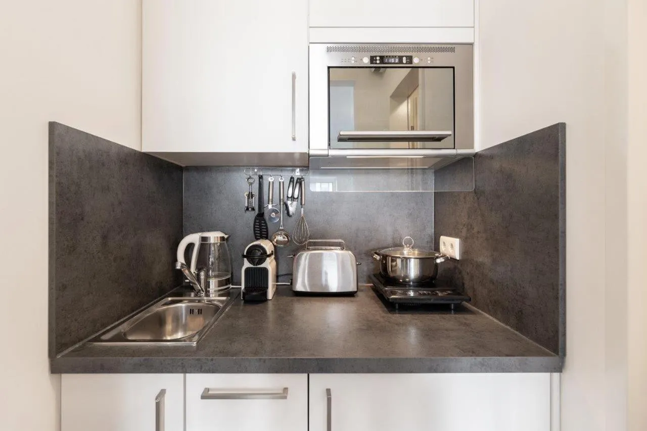 Kitchen or kitchenette in TRIO Apartment Hotel Berlin