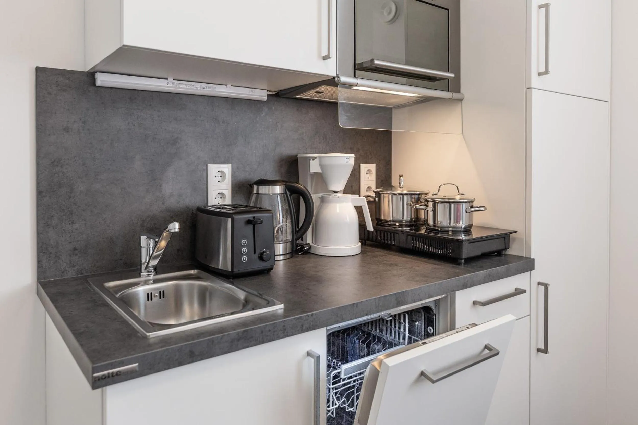 Kitchen or kitchenette in TRIO Apartment Hotel Berlin