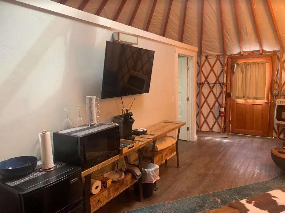 Communal lounge/ TV room in Escalante Yurts - Luxury Lodging