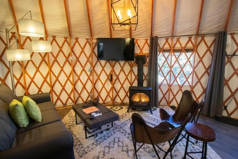Communal lounge/ TV room in Escalante Yurts - Luxury Lodging