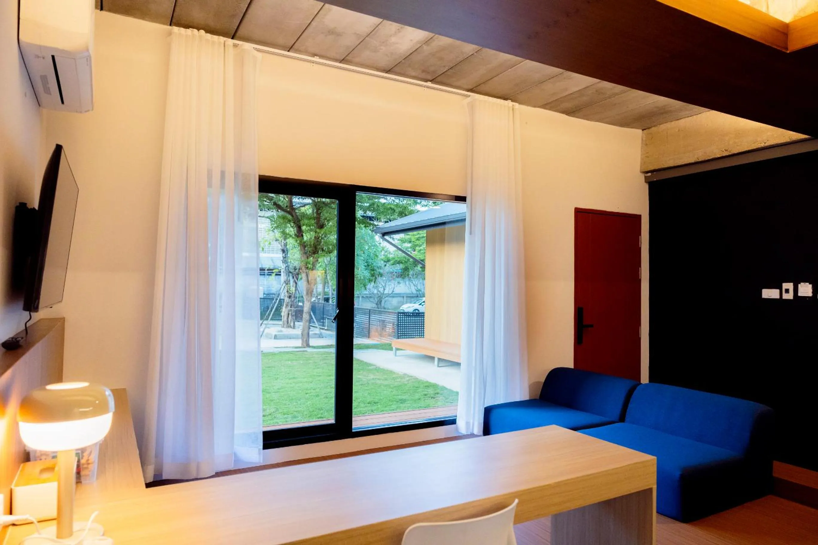 Communal lounge/ TV room in Karpenter Lampang