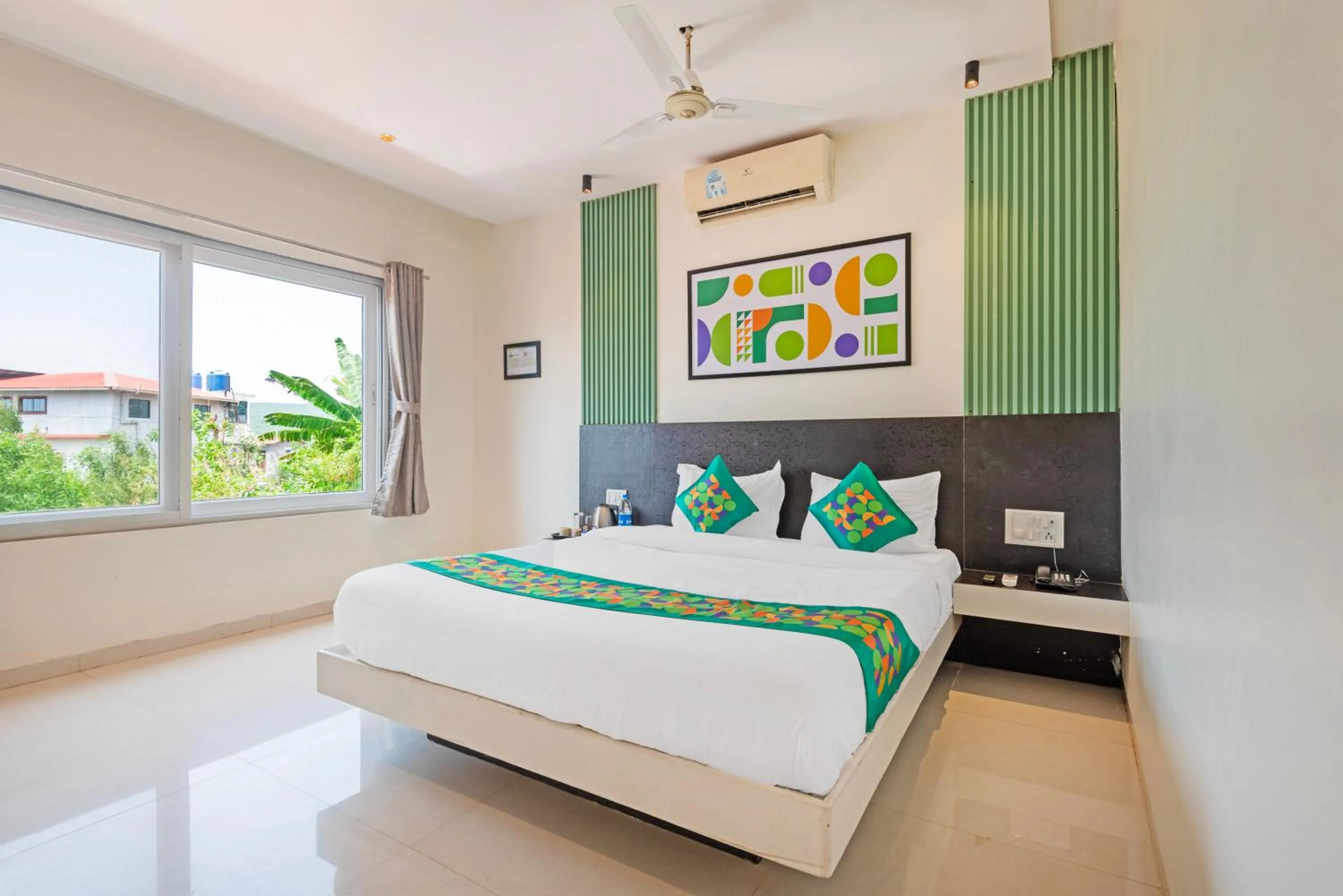 Bedroom, Bed in Treebo Kuber Palace with Swimming Pool