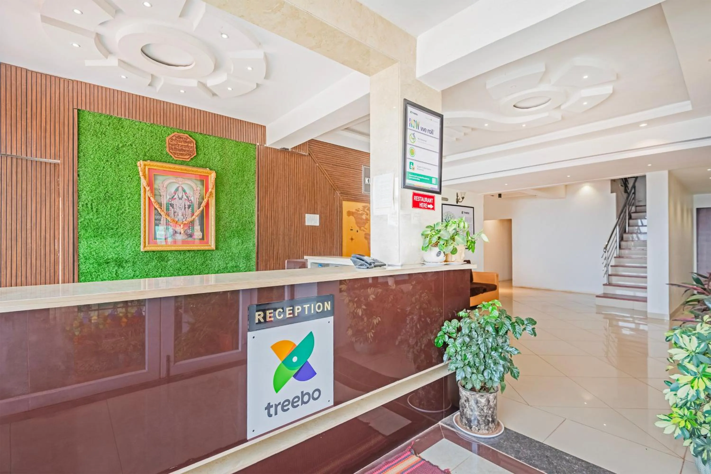 Lobby or reception in Treebo Kuber Palace with Swimming Pool