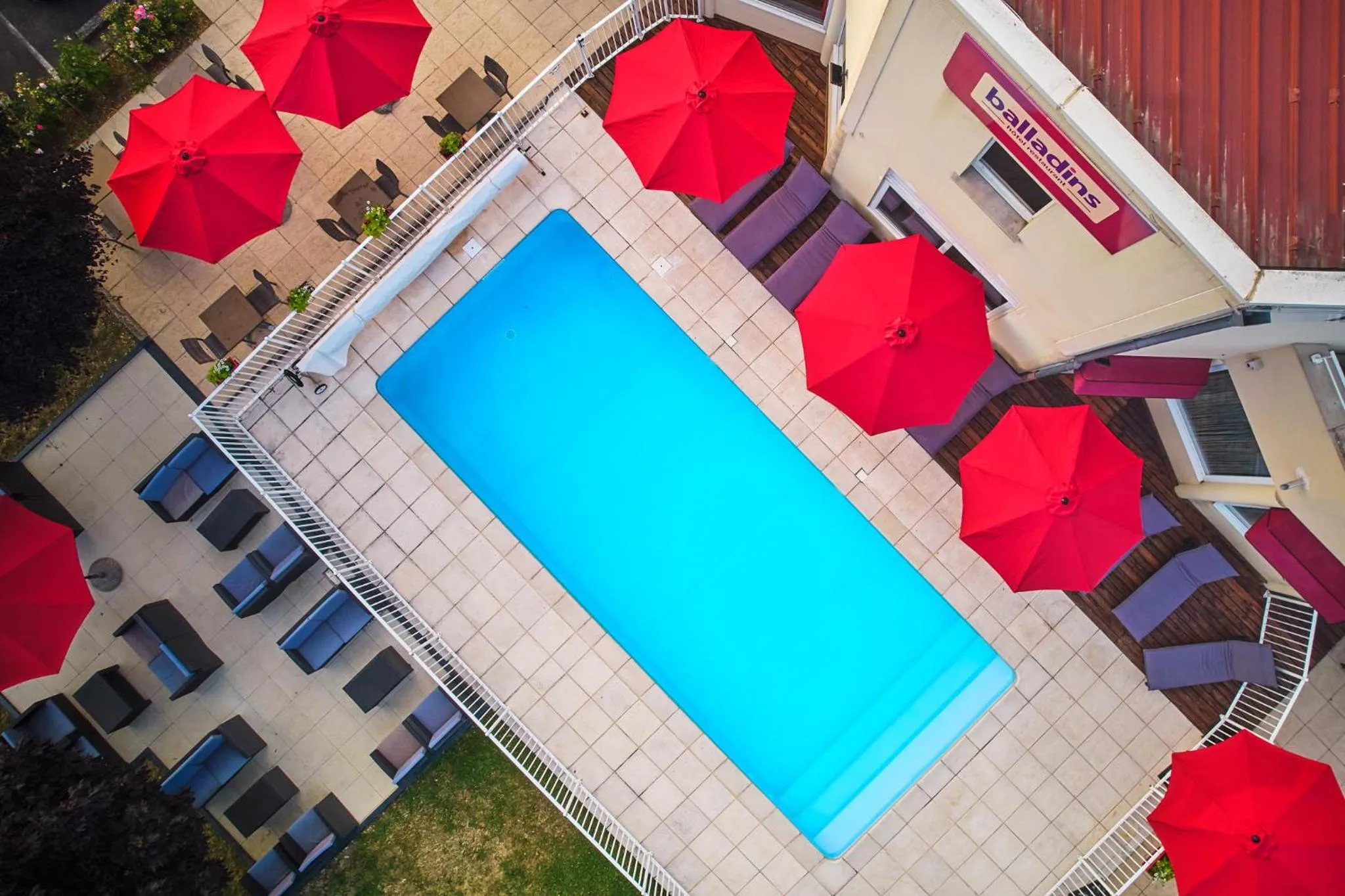 Swimming pool in Authentic by balladins Dijon / Marsannay-la-Côte