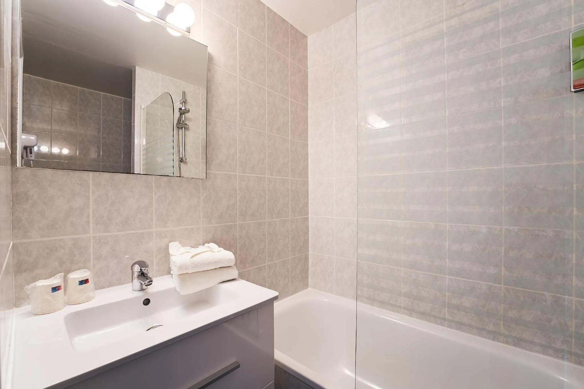 Bathroom in Authentic by balladins Dijon / Marsannay-la-Côte