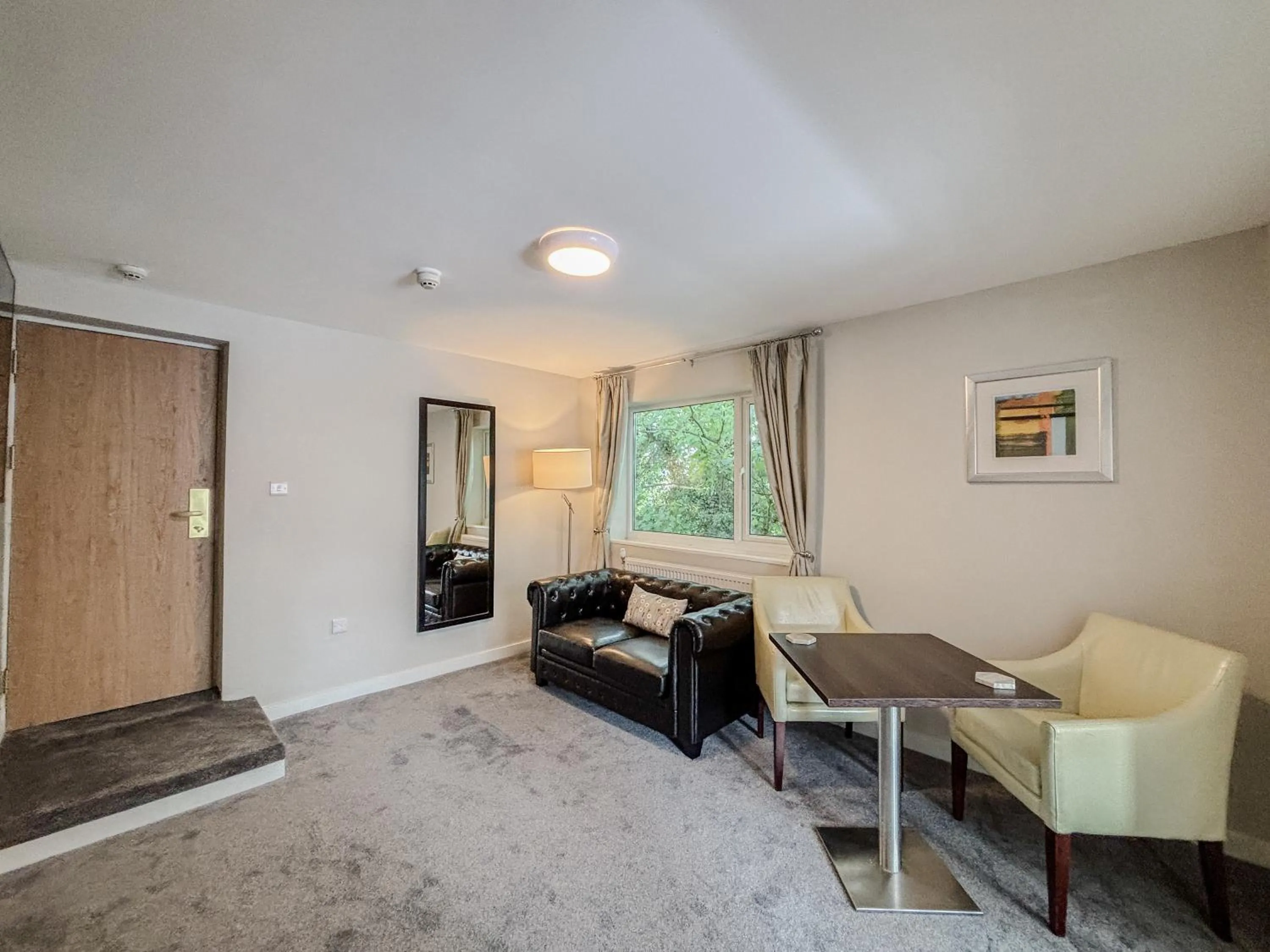 Living room in Ivy Bush Royal Hotel by Compass Hospitality