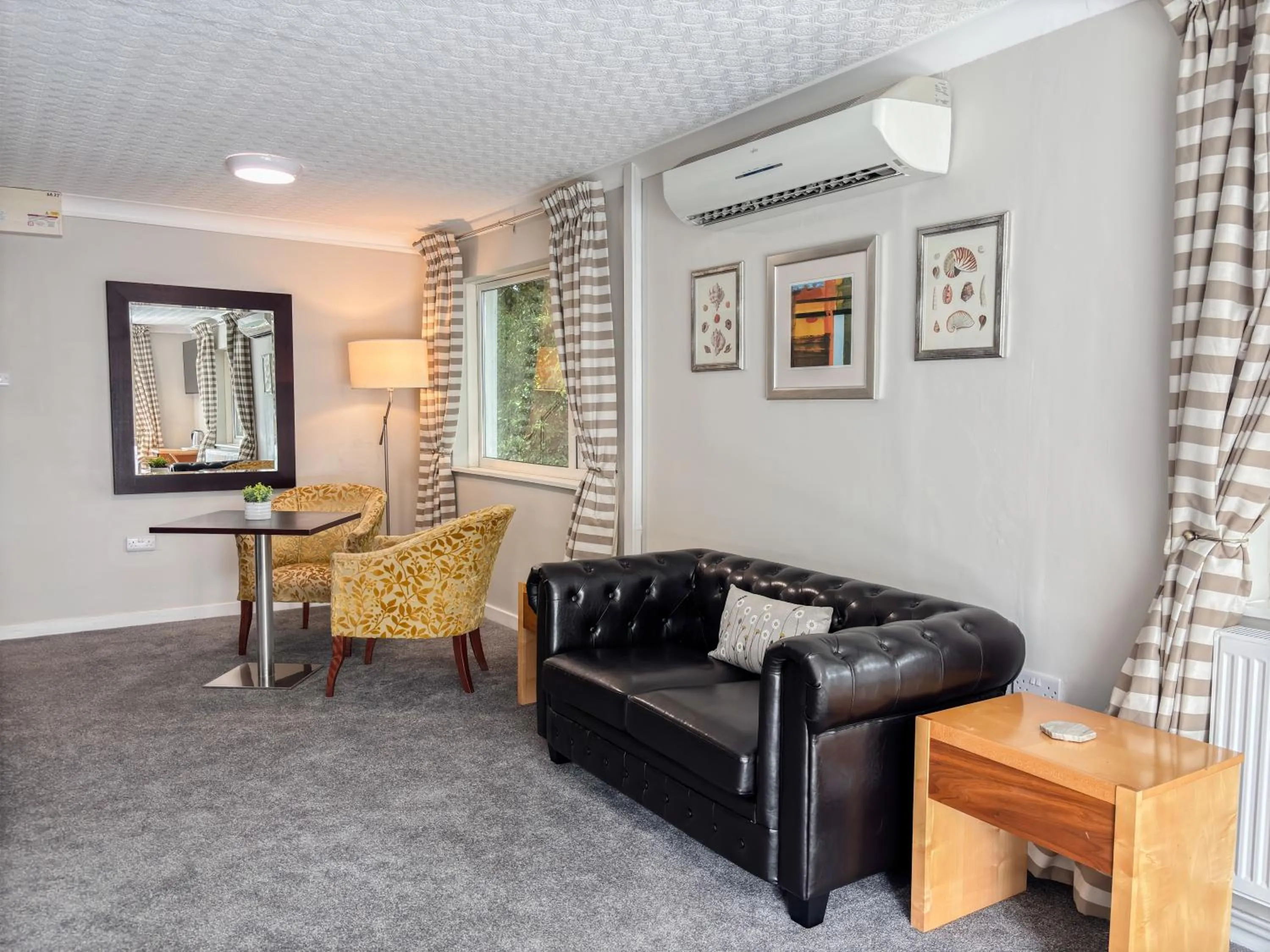 Living room in Ivy Bush Royal Hotel by Compass Hospitality