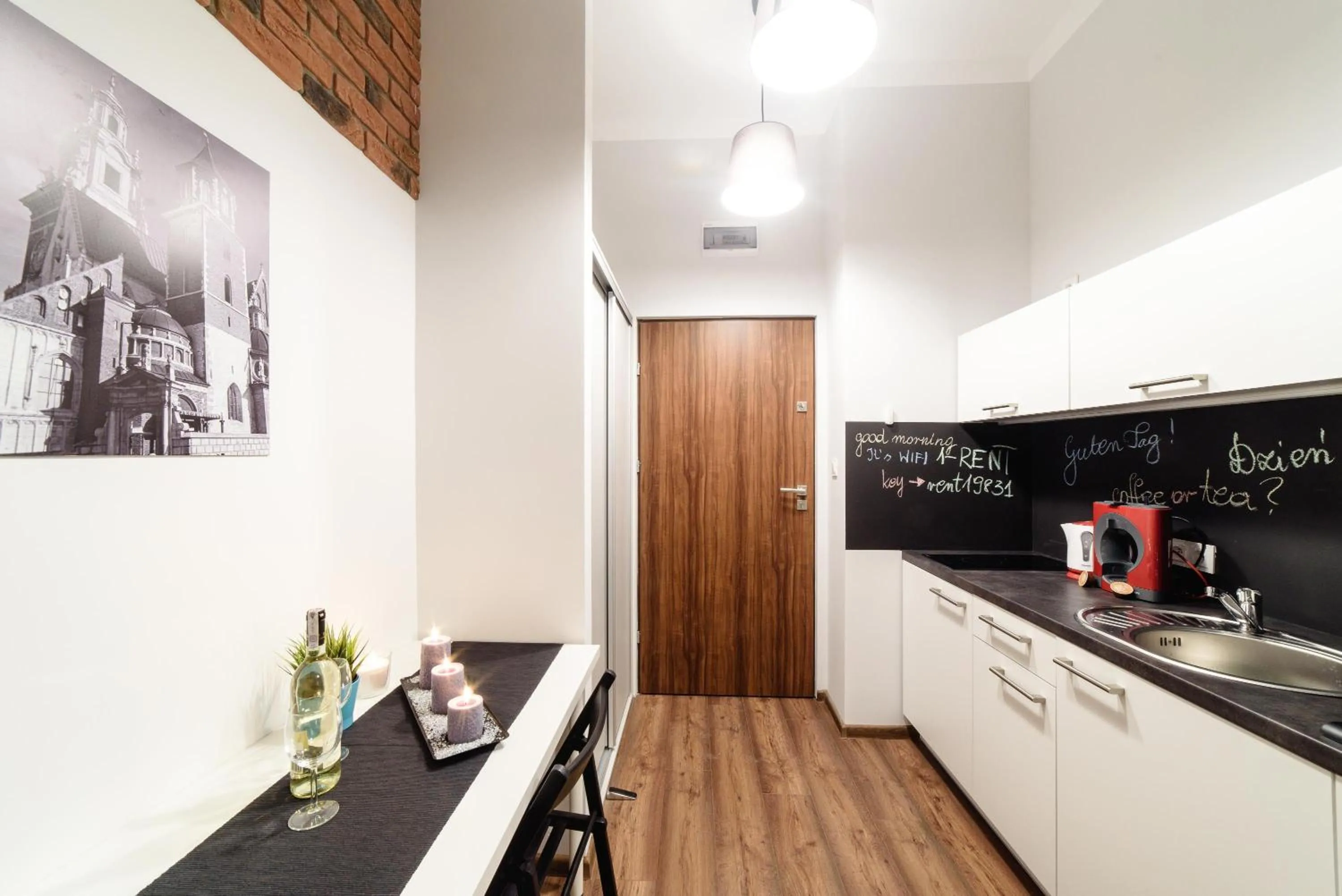 Kitchen or kitchenette in 2 Nights Apartments - great location, right next to Main Rail and Bus Station, 10 min to Main Square by foot