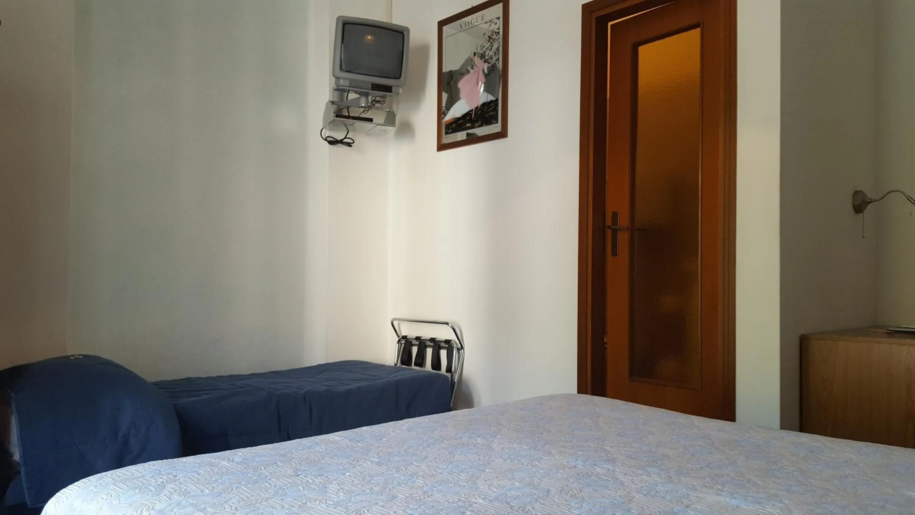 Bedroom in Hotel Firenze