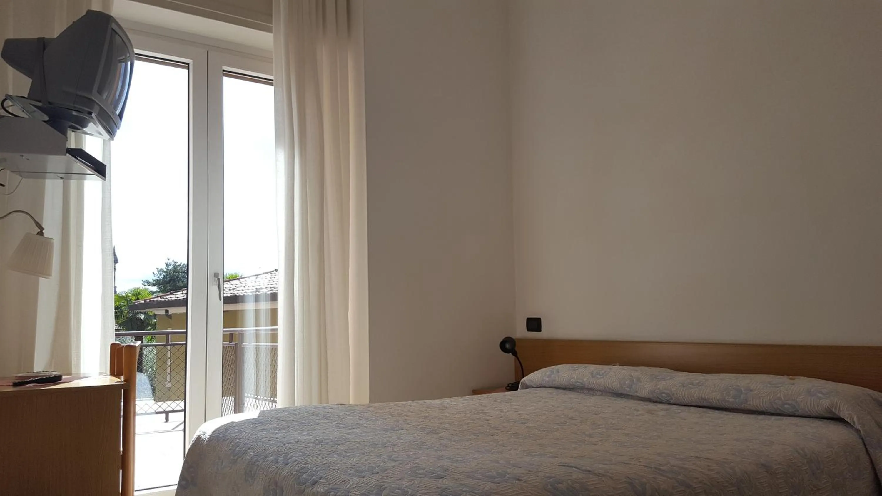 Bedroom in Hotel Firenze