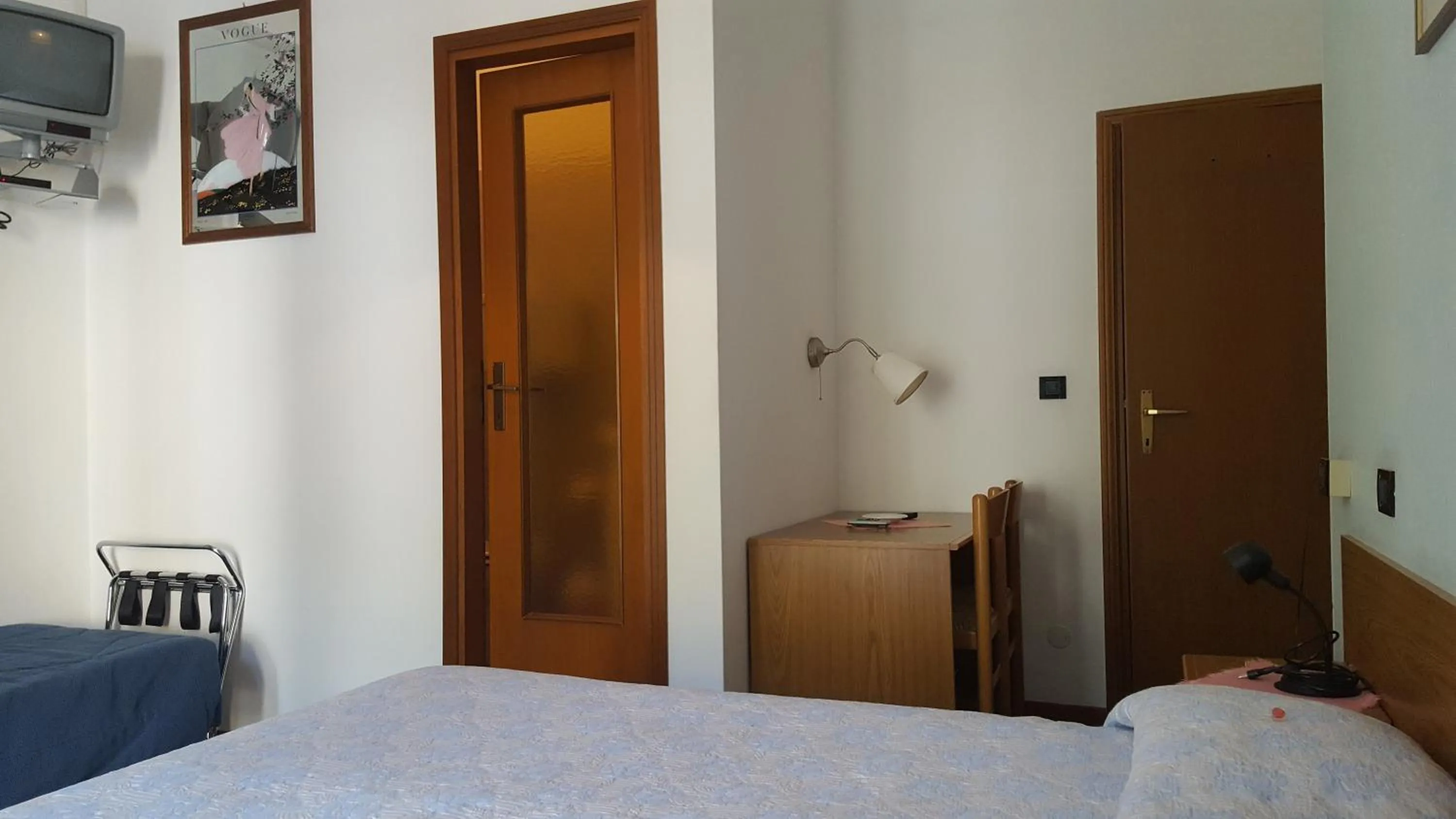 Bedroom in Hotel Firenze