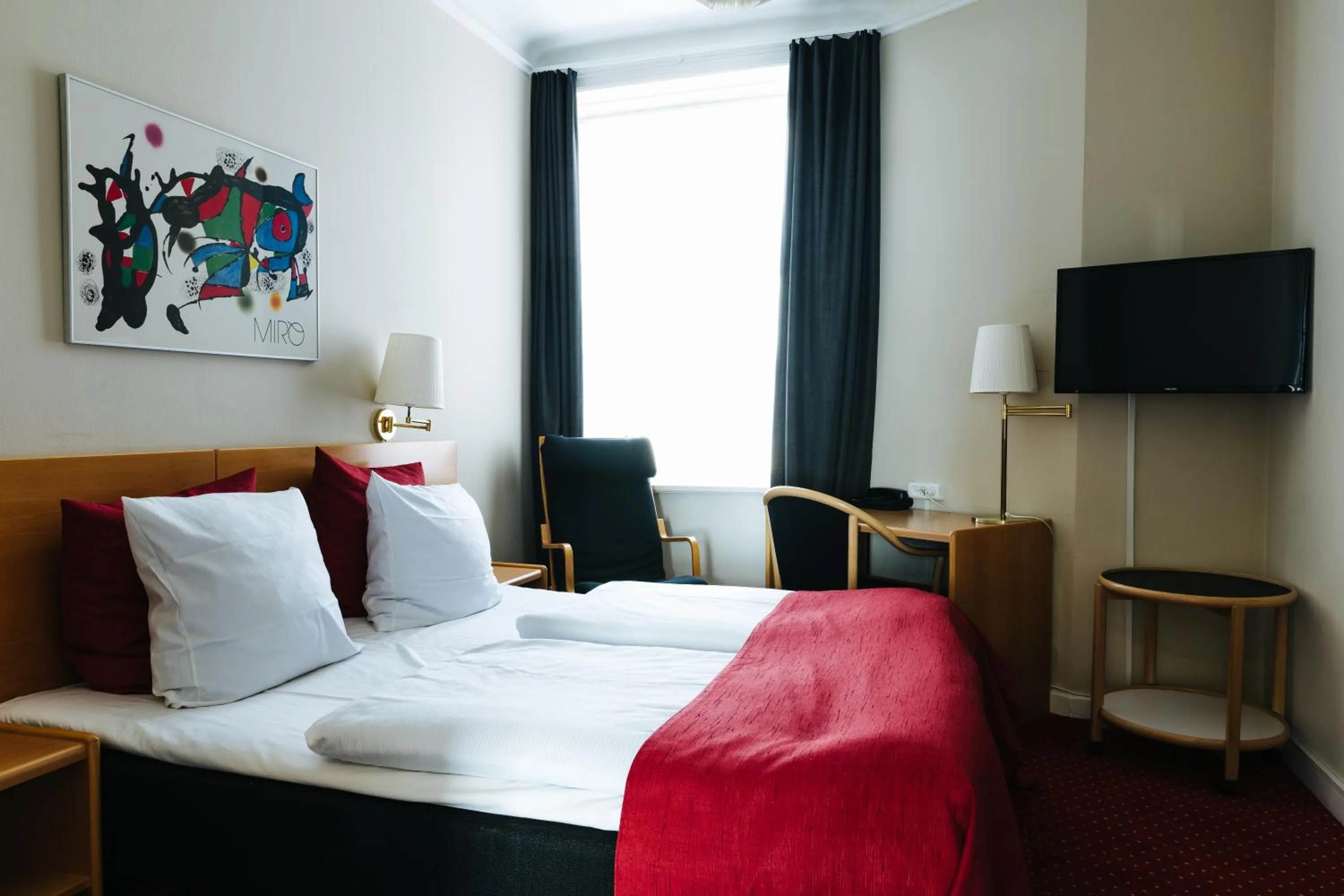 Bed in City Hotel Nebo