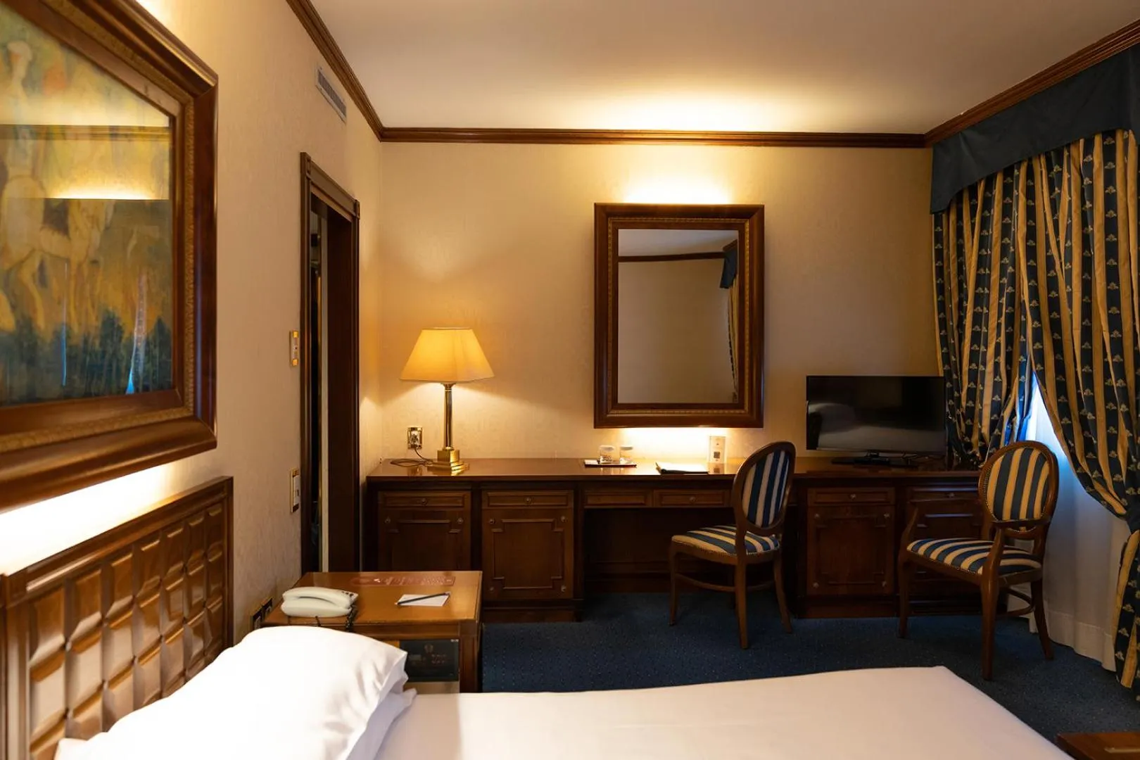 Photo of the whole room, Bed in Grand Hotel Trento