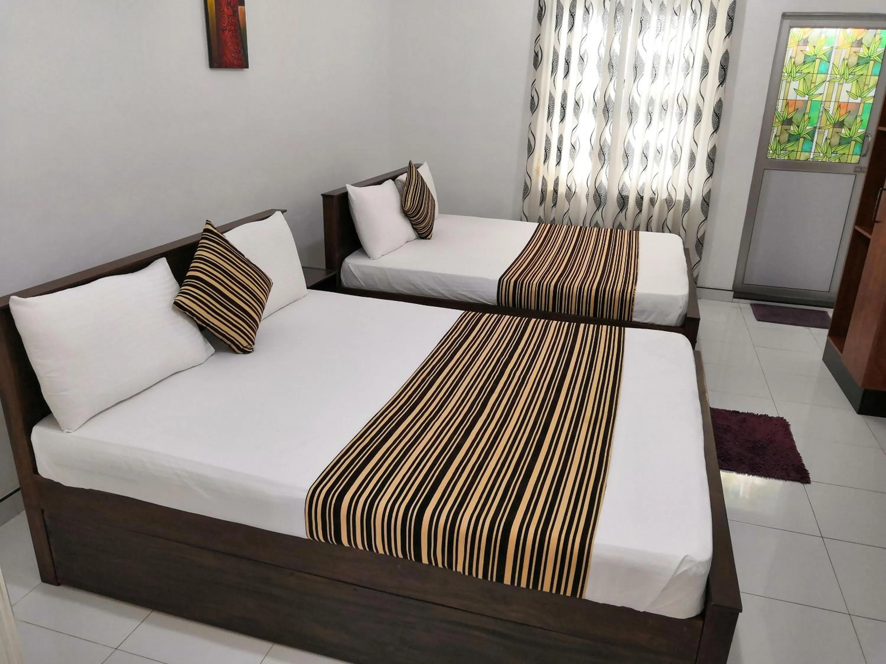 Bed in Bon Voyaage Tourist Inn