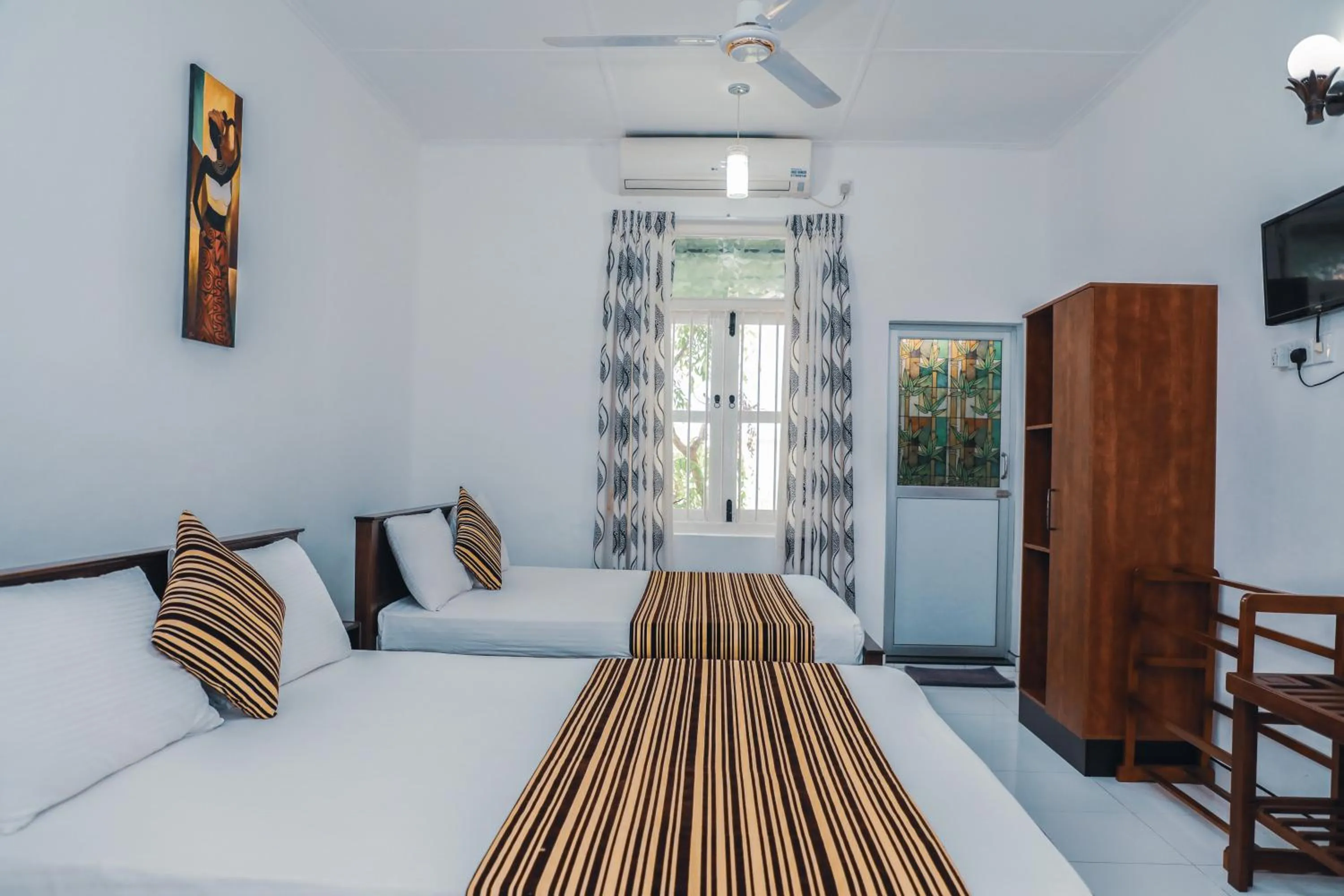 Bed in Bon Voyaage Tourist Inn