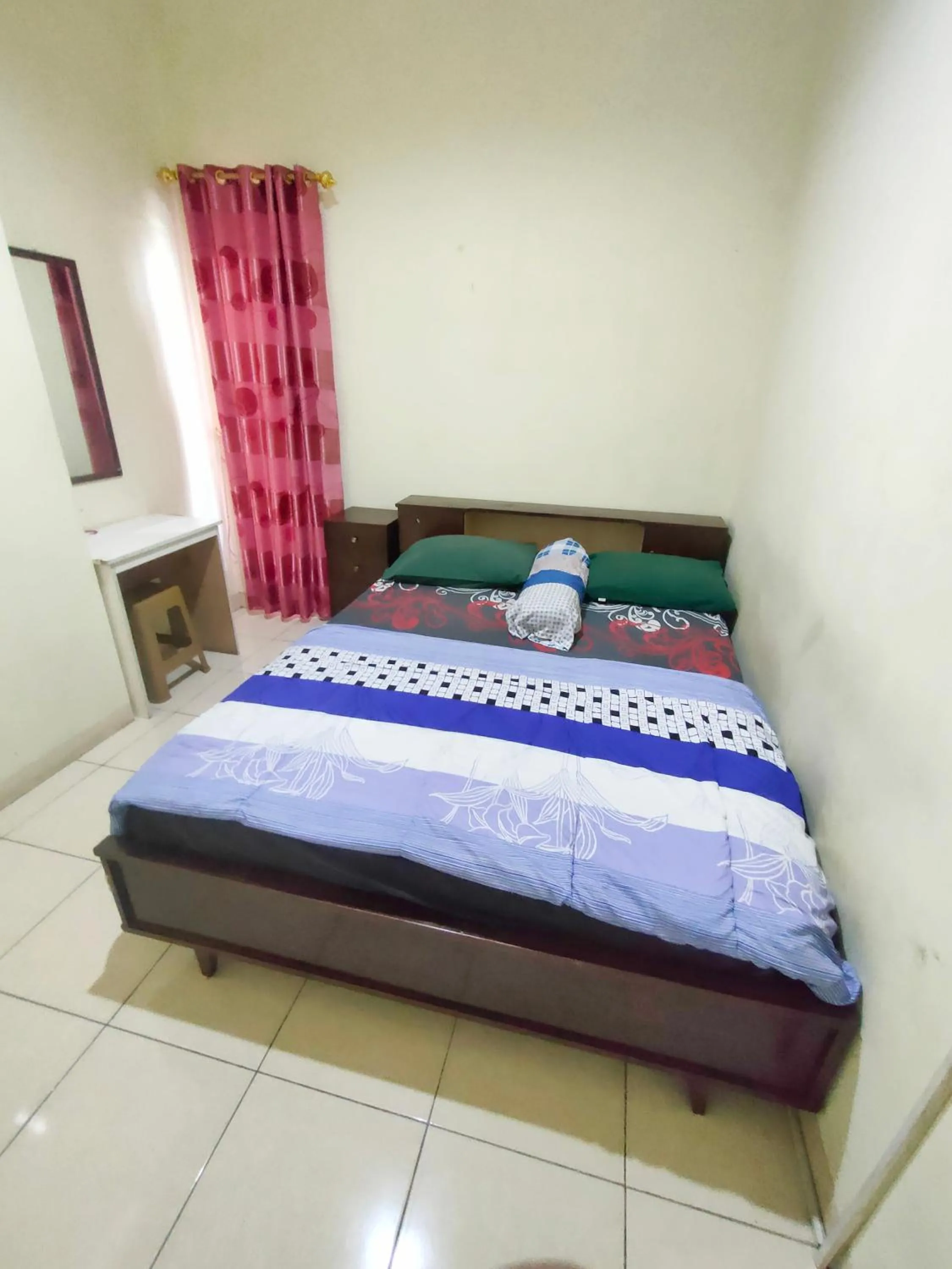 Bedroom in Radio Backpacker Guesthouse Syariah