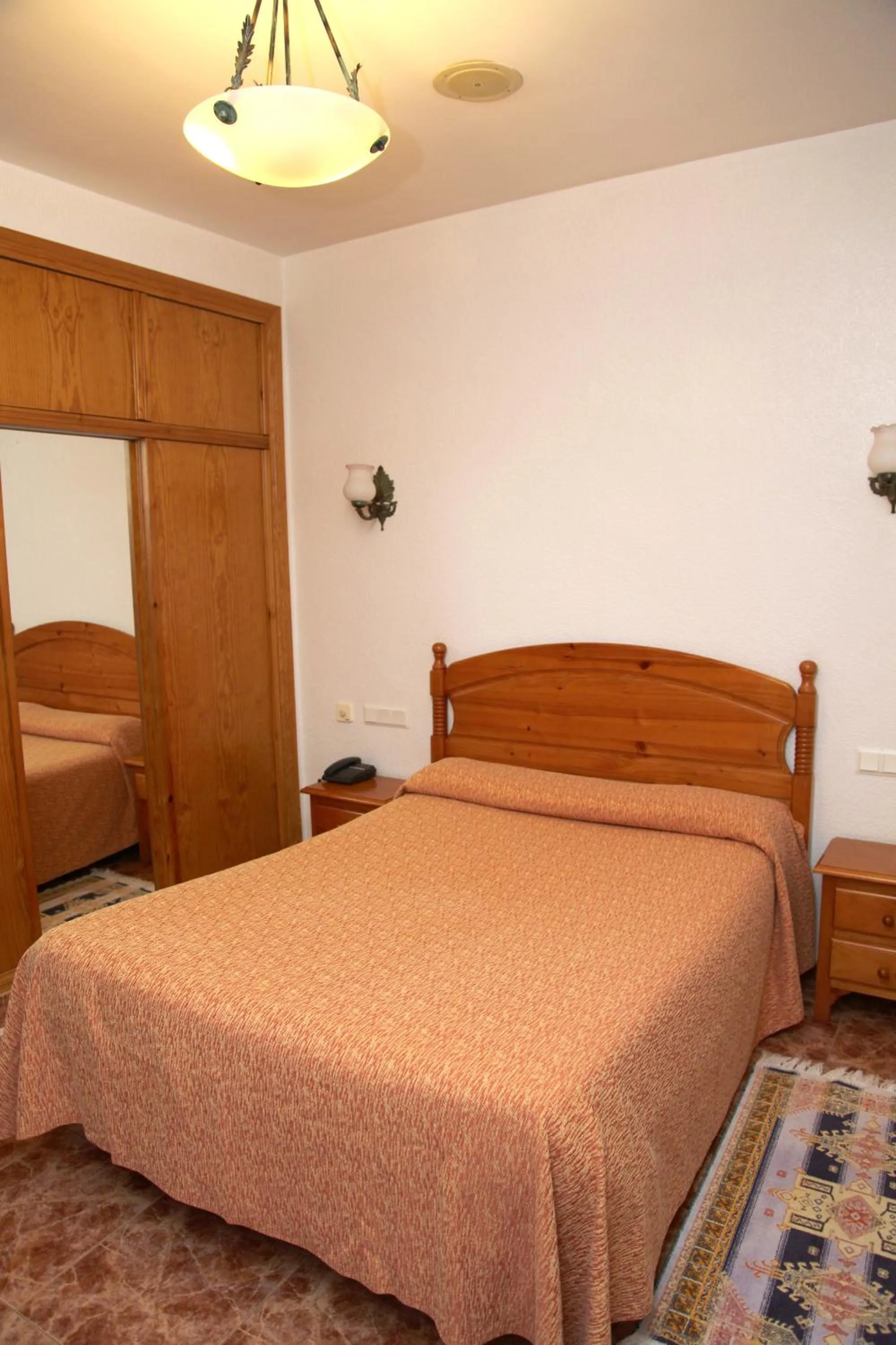 Bed in Hotel Los Arcos