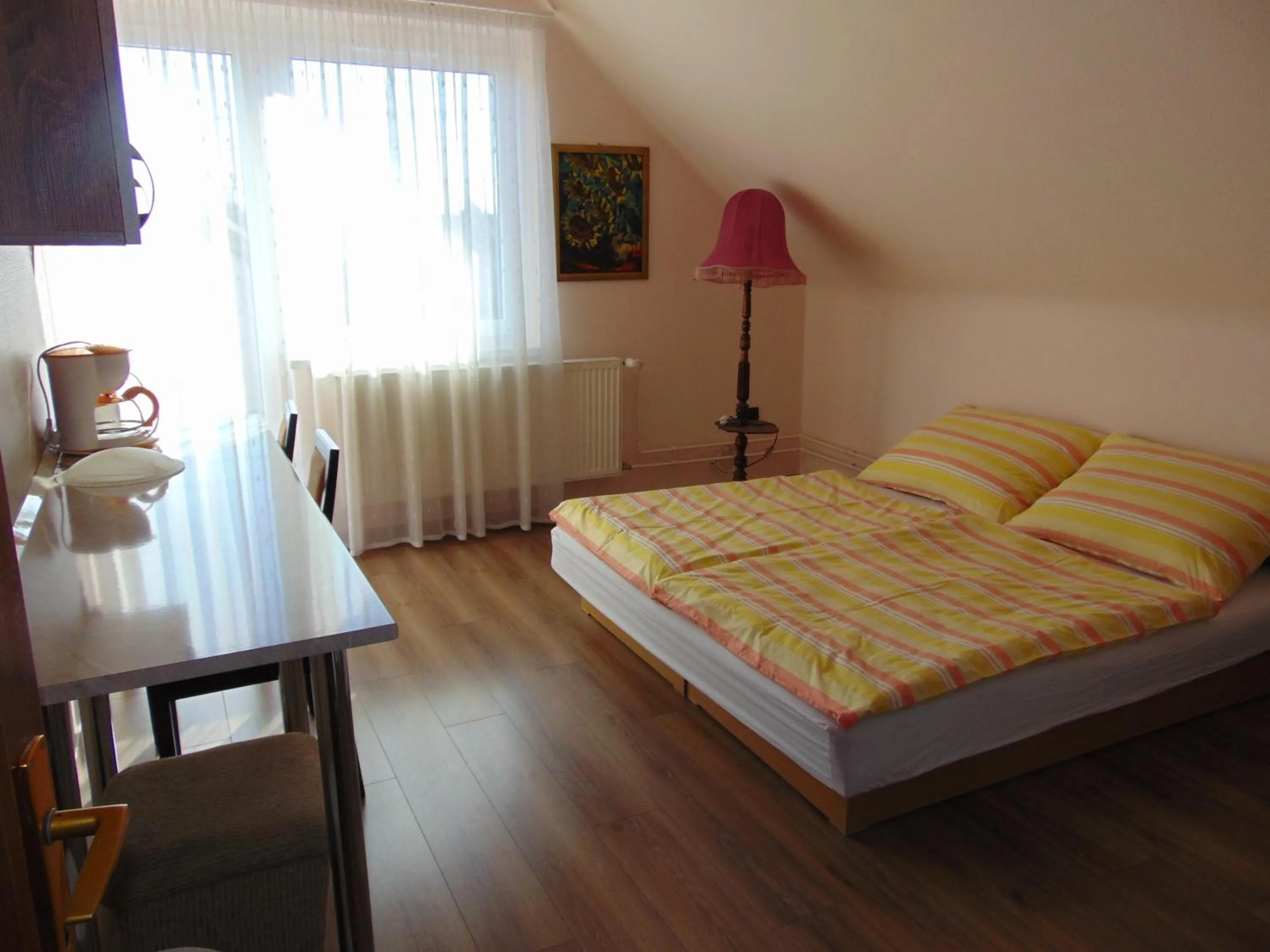 Bed in Anna Báthory Apartmanház