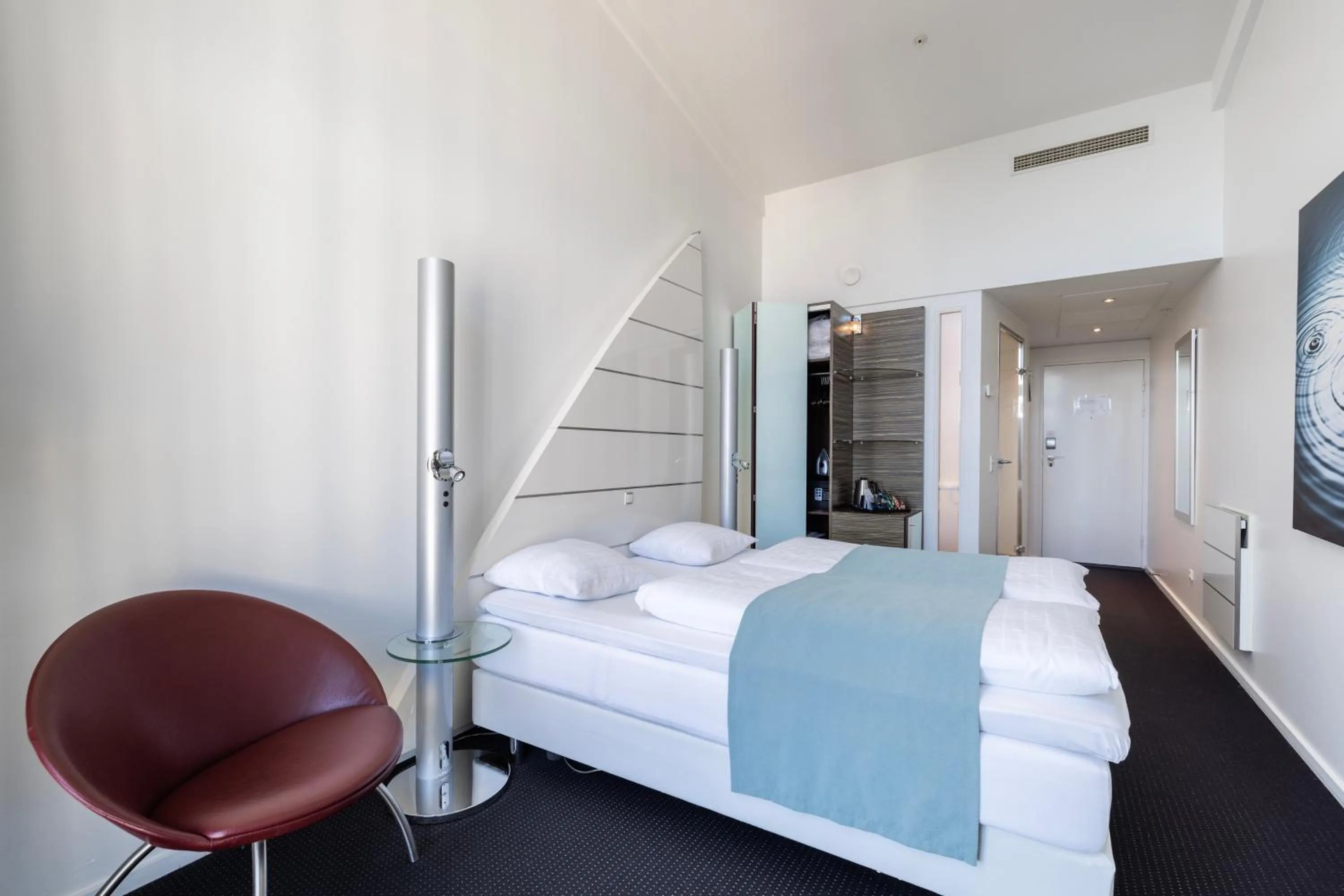 Bed in Copenhagen Island Hotel