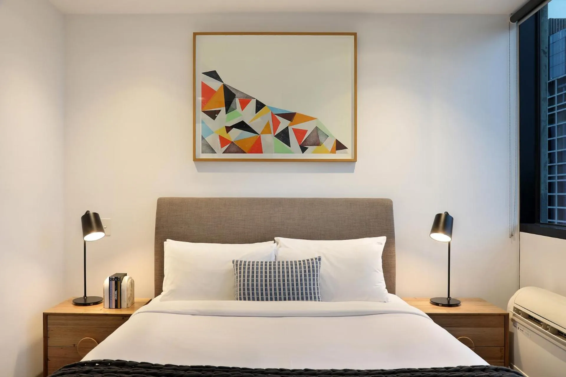 Bed in The Canvas Apartment Hotel