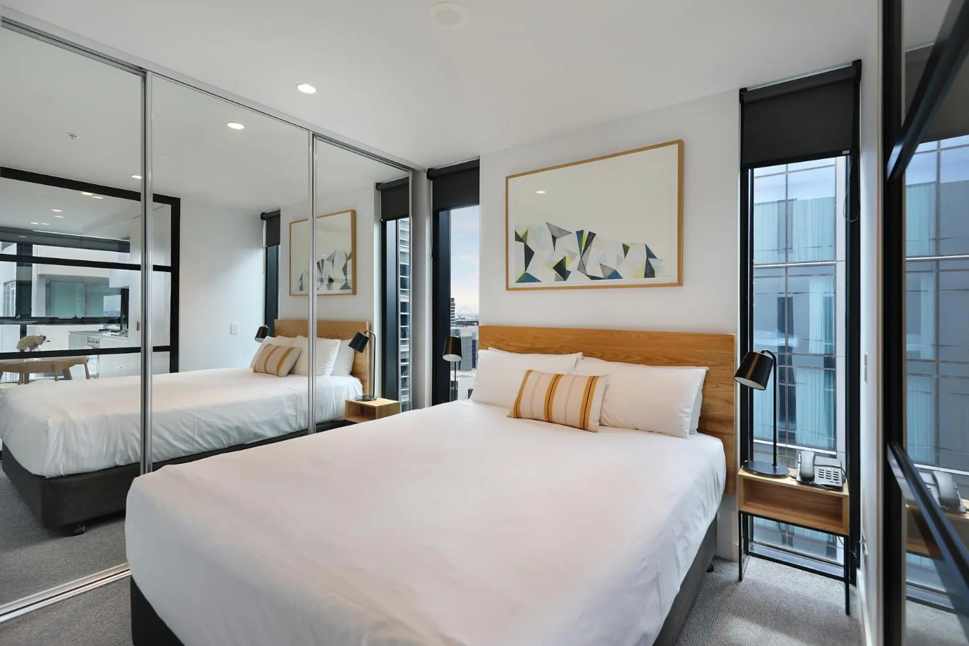 Bed in The Canvas Apartment Hotel