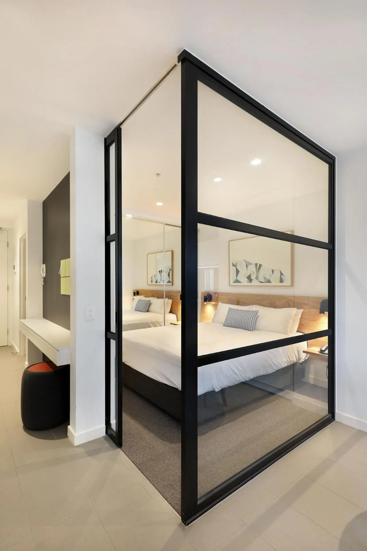 Bed in The Canvas Apartment Hotel