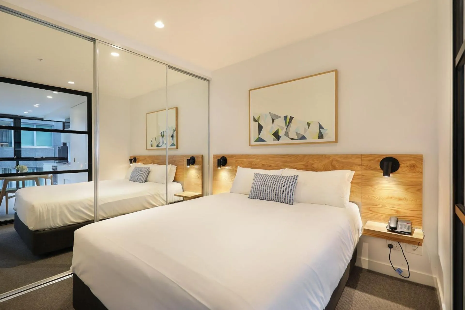 Bed in The Canvas Apartment Hotel