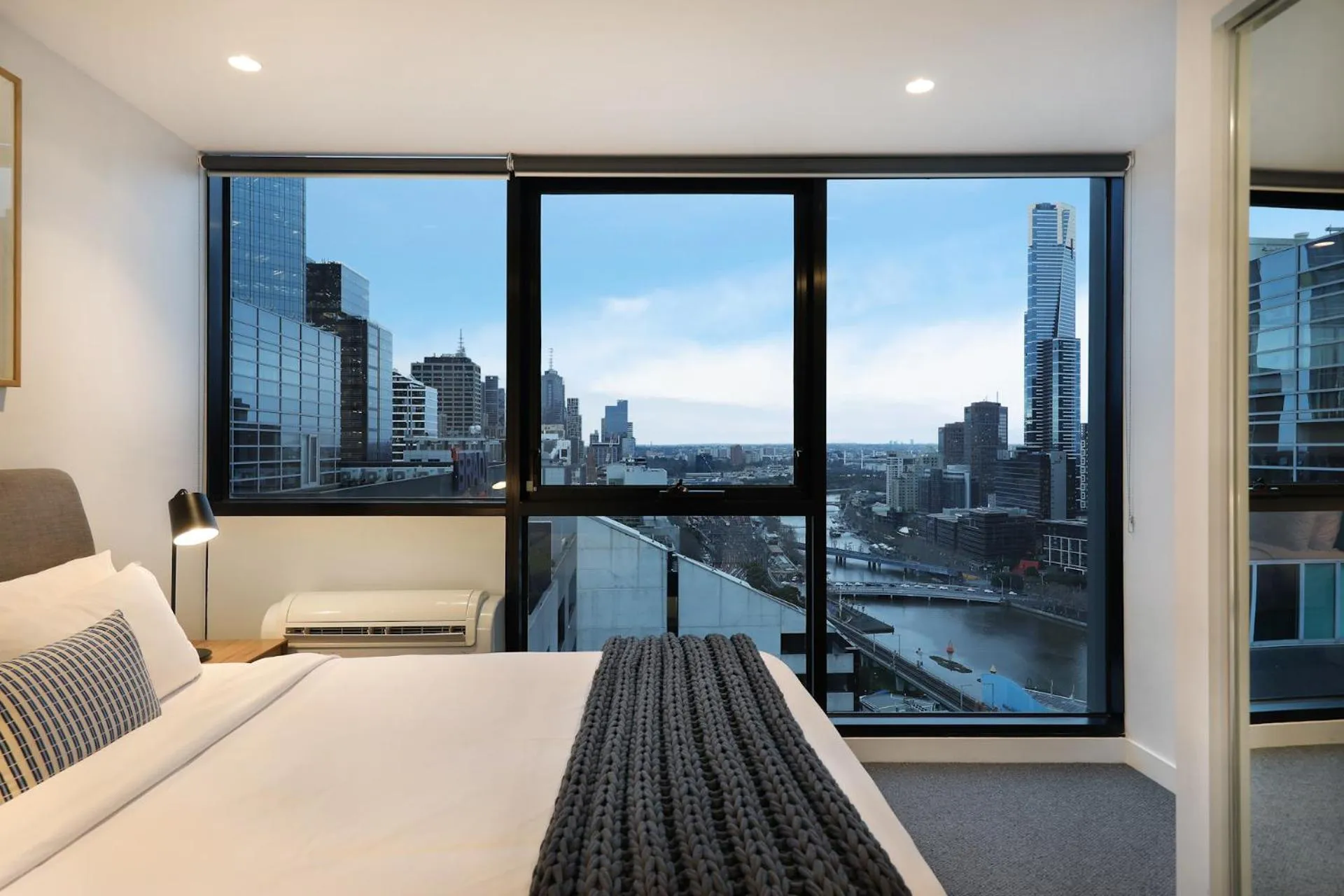 Bed in The Canvas Apartment Hotel