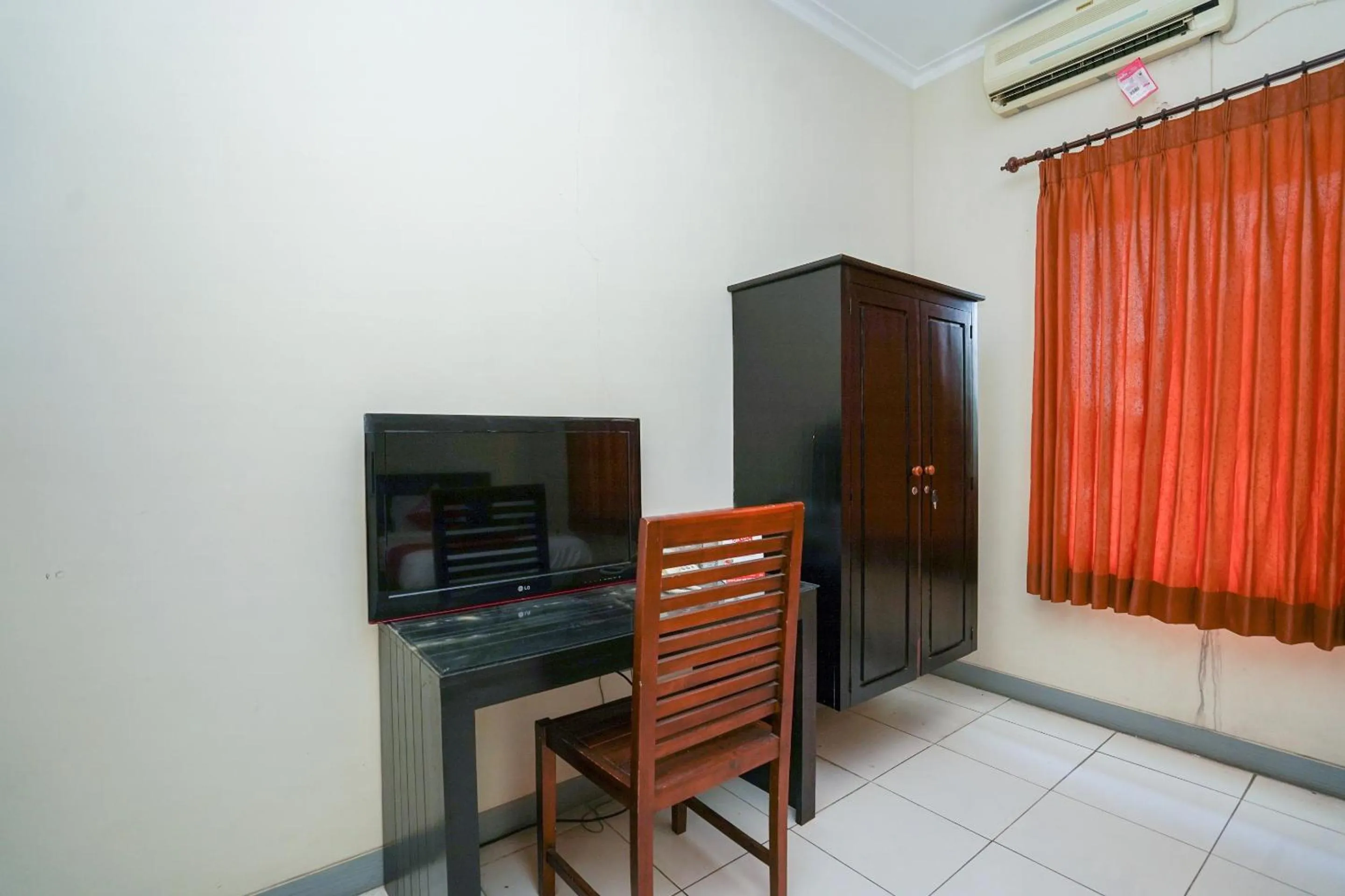 Bedroom in Capital O 1430 Hotel Ratna Syariah