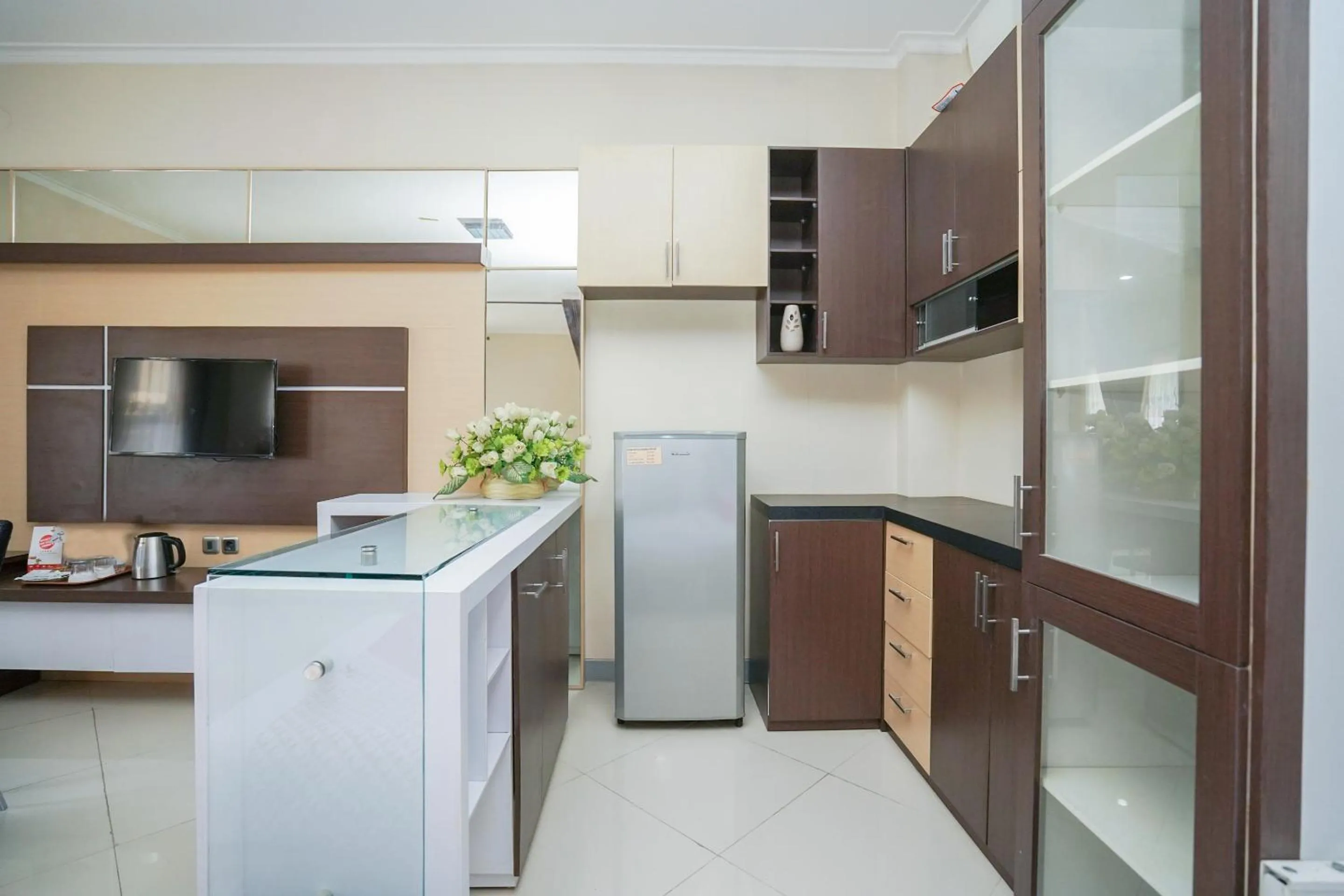Kitchen or kitchenette in Capital O 1430 Hotel Ratna Syariah