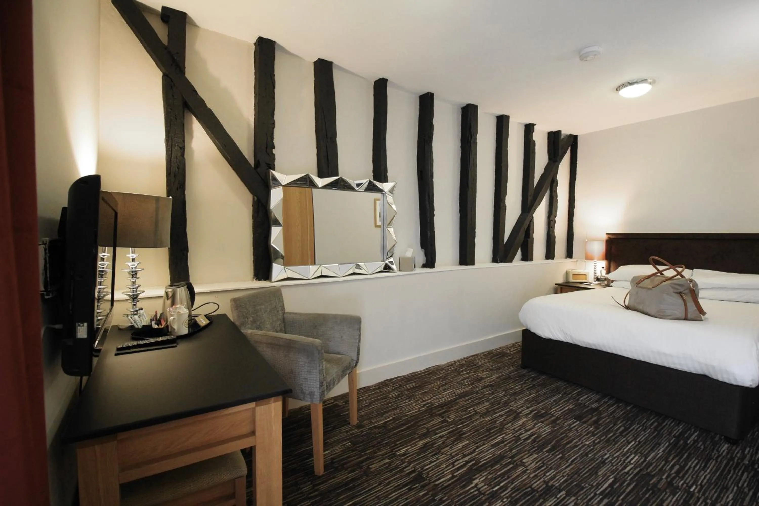 Bed in The Saracens Head Hotel