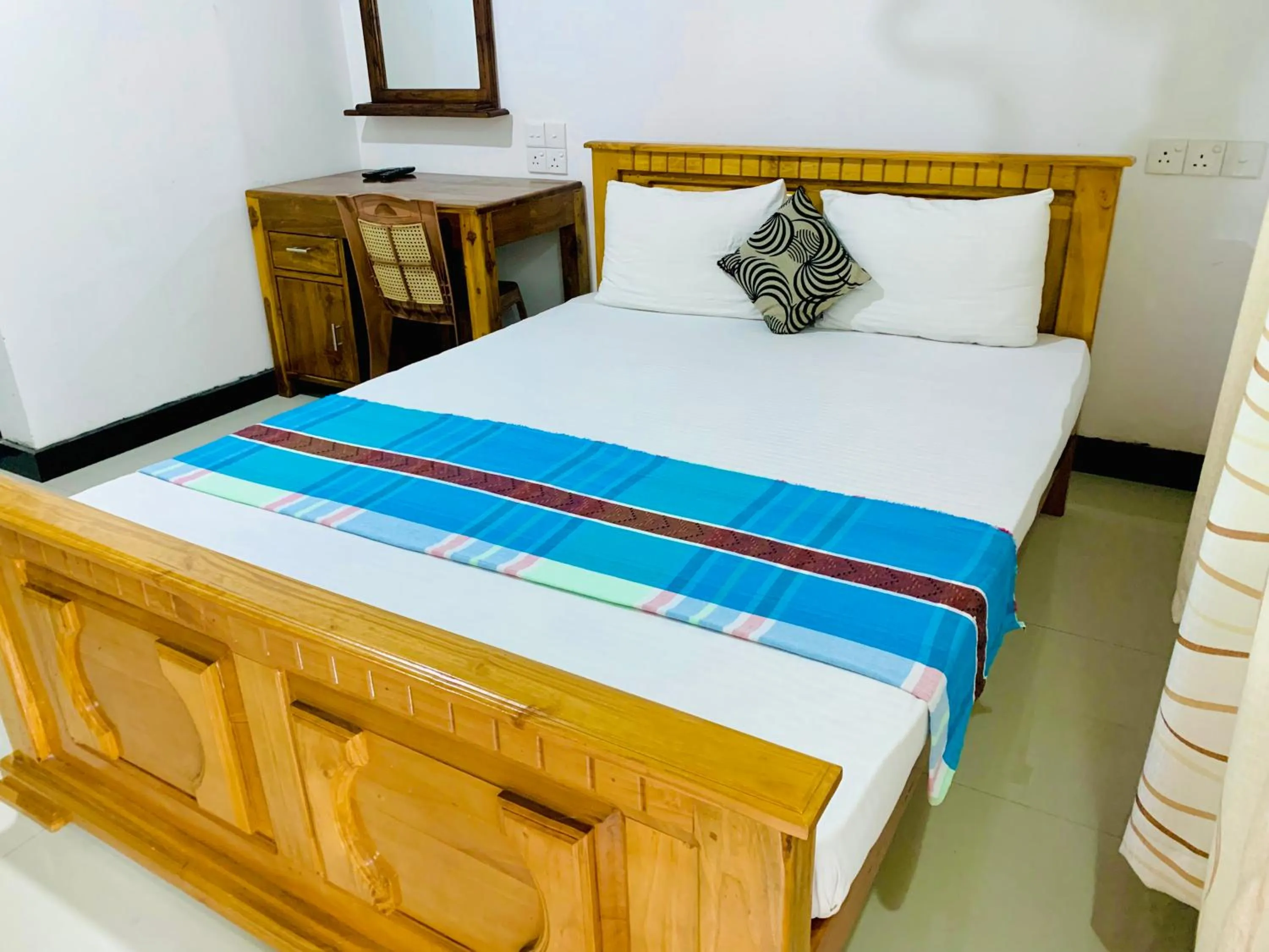 Bed in Rich Resort & Restaurant