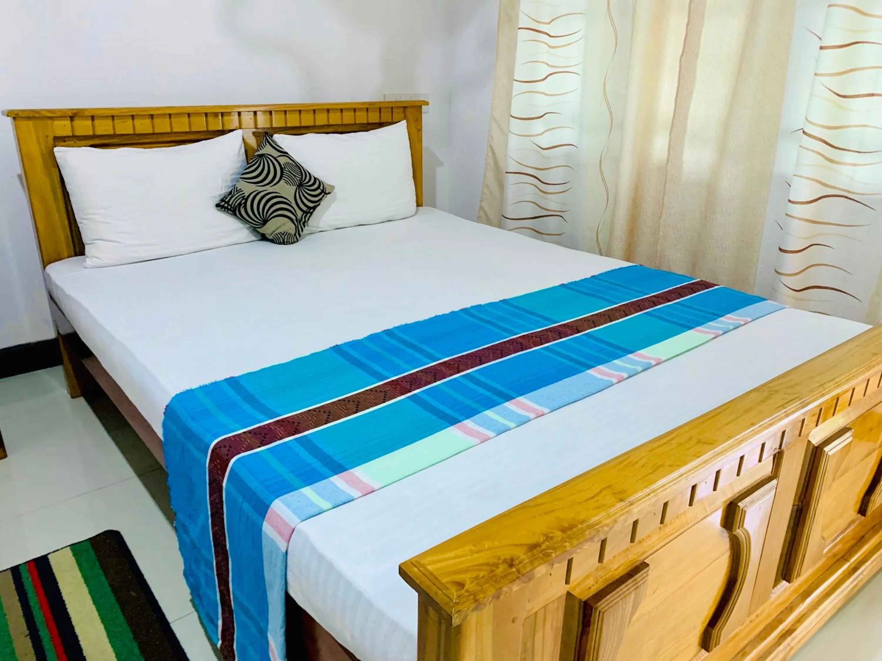 Bed in Rich Resort & Restaurant