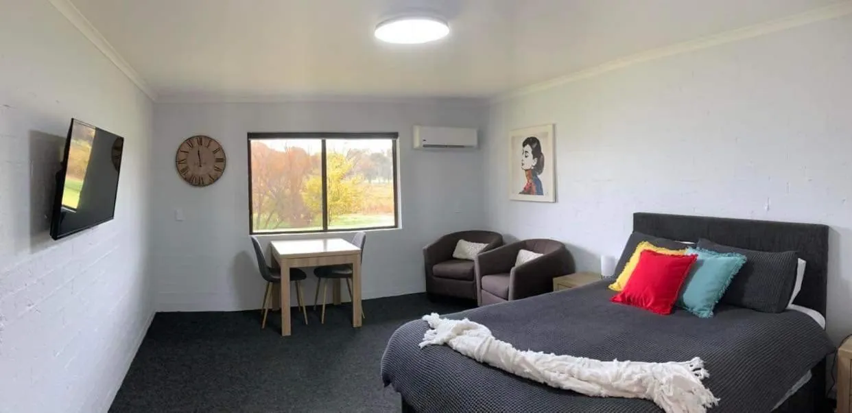 Bed in Colonial Inn Guest Rooms