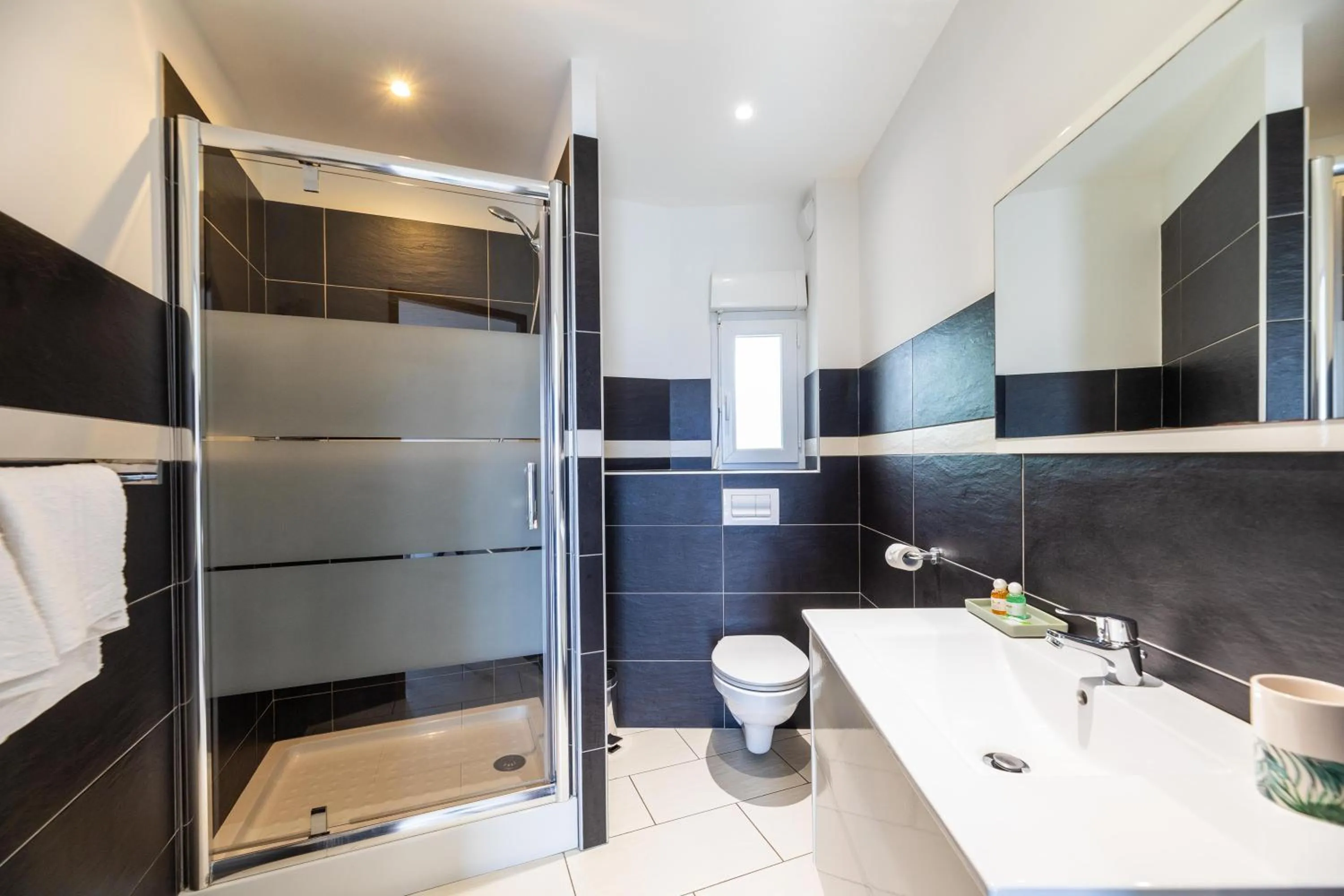 Bathroom in Les Alizés Résidence & Spa