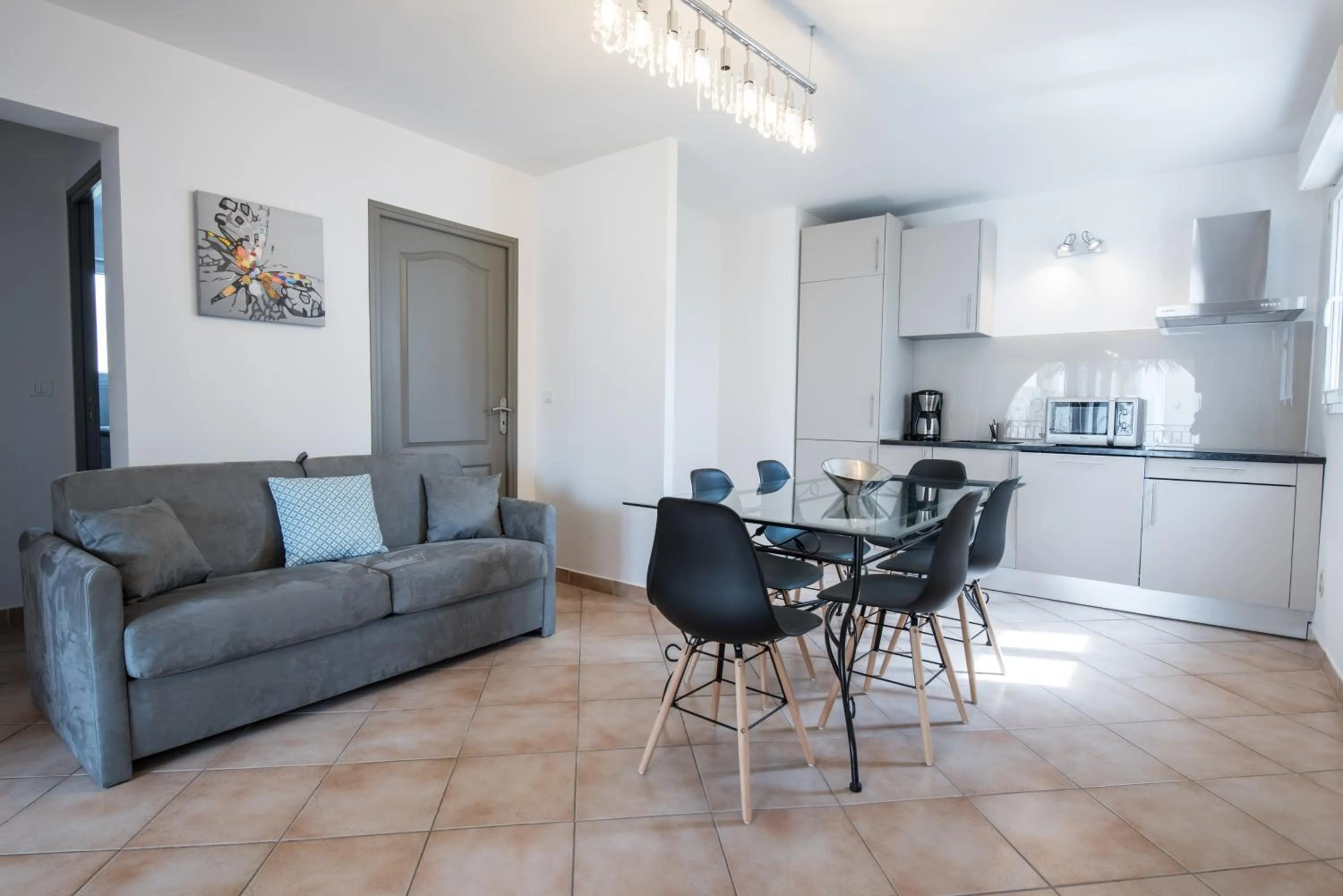 TV and multimedia in Les Alizés Résidence & Spa