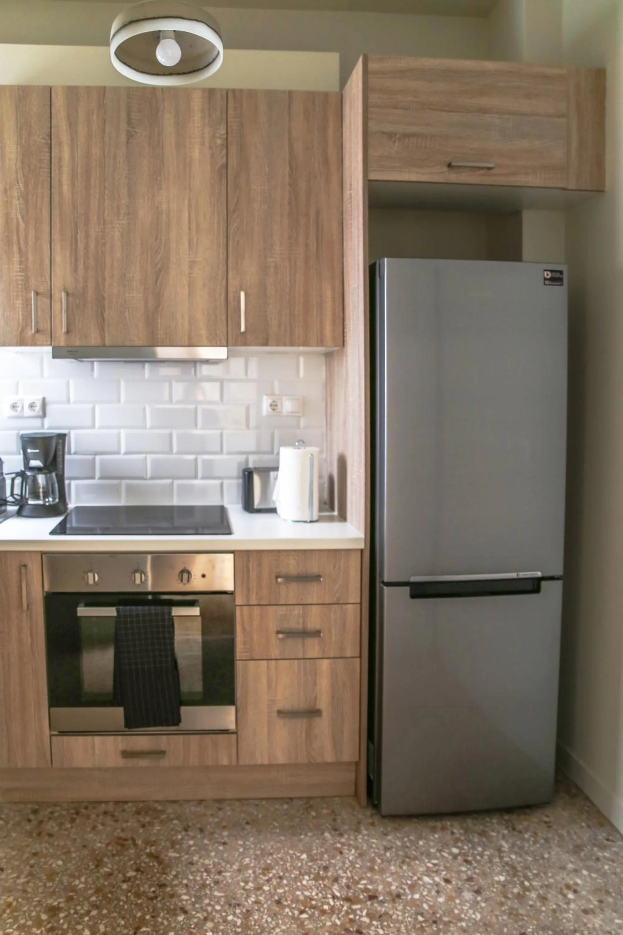 Kitchen or kitchenette in Muses Residence