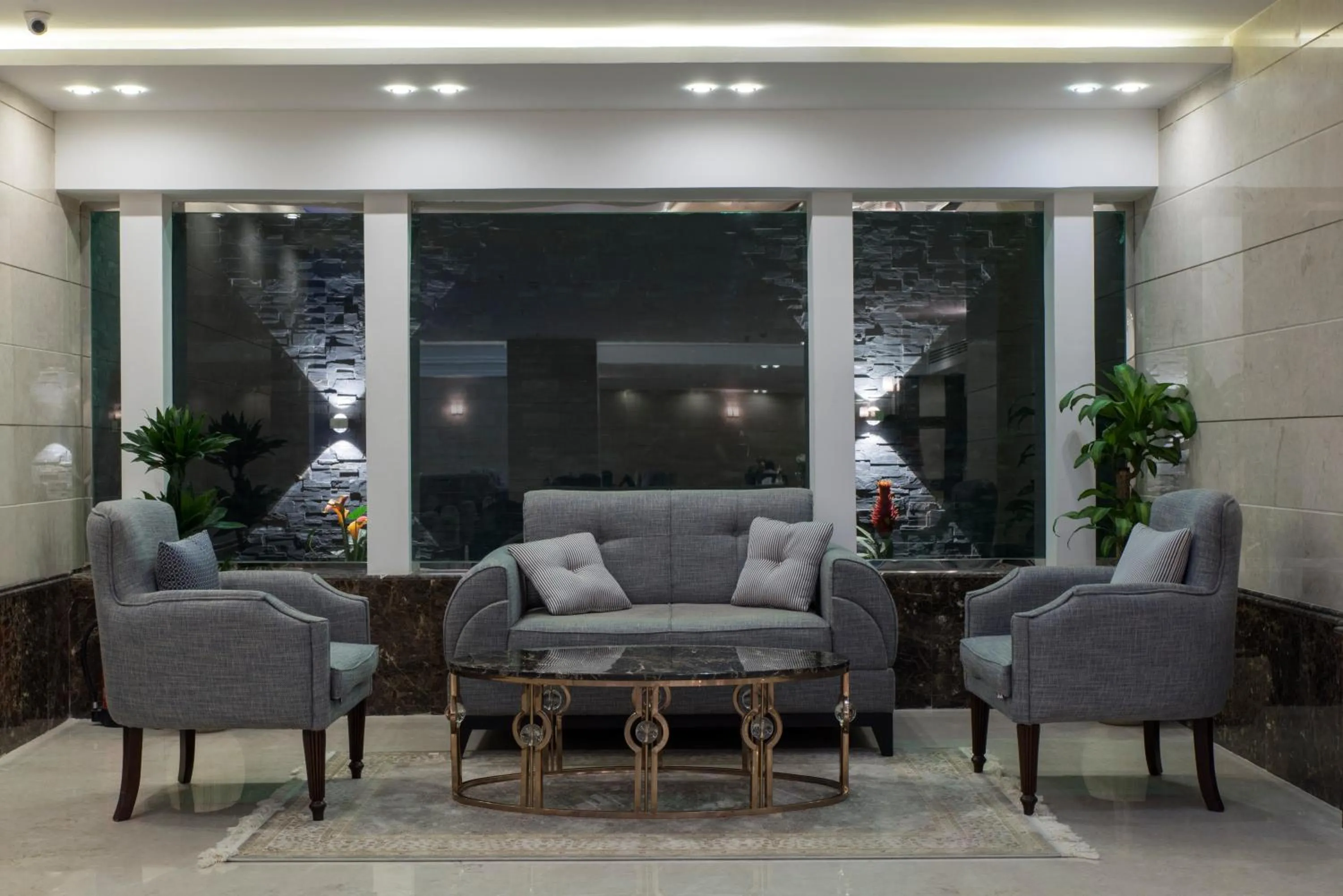 Lobby or reception in Remaz Suites Hotel