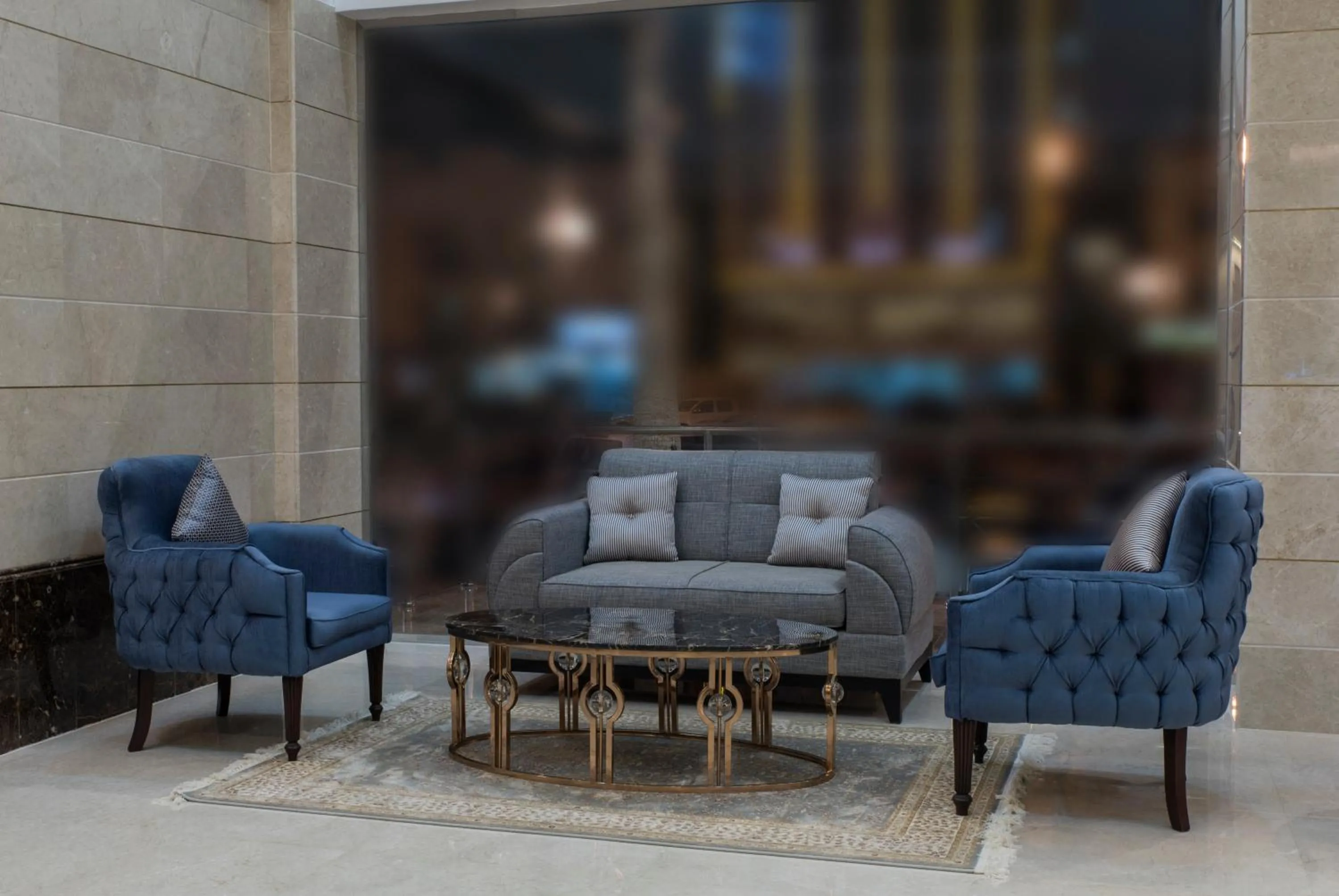 Lobby or reception in Remaz Suites Hotel