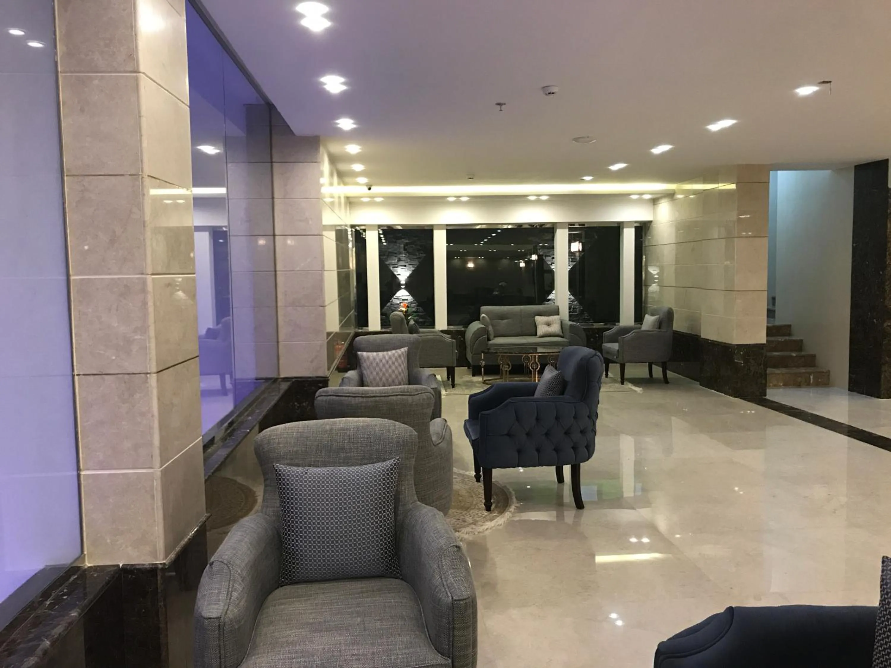 Lobby or reception in Remaz Suites Hotel
