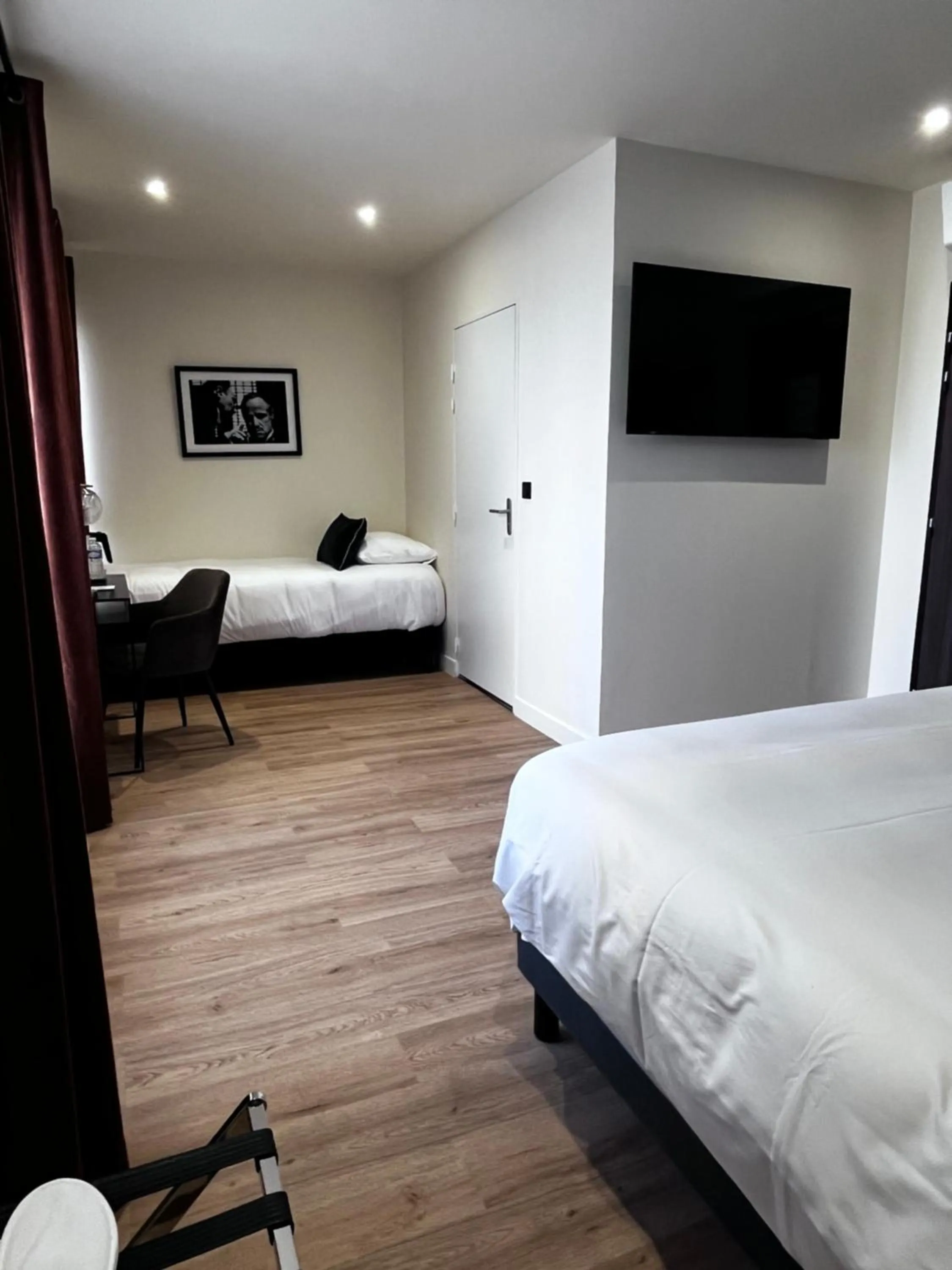 Bed in Hotel Acadie Eragny