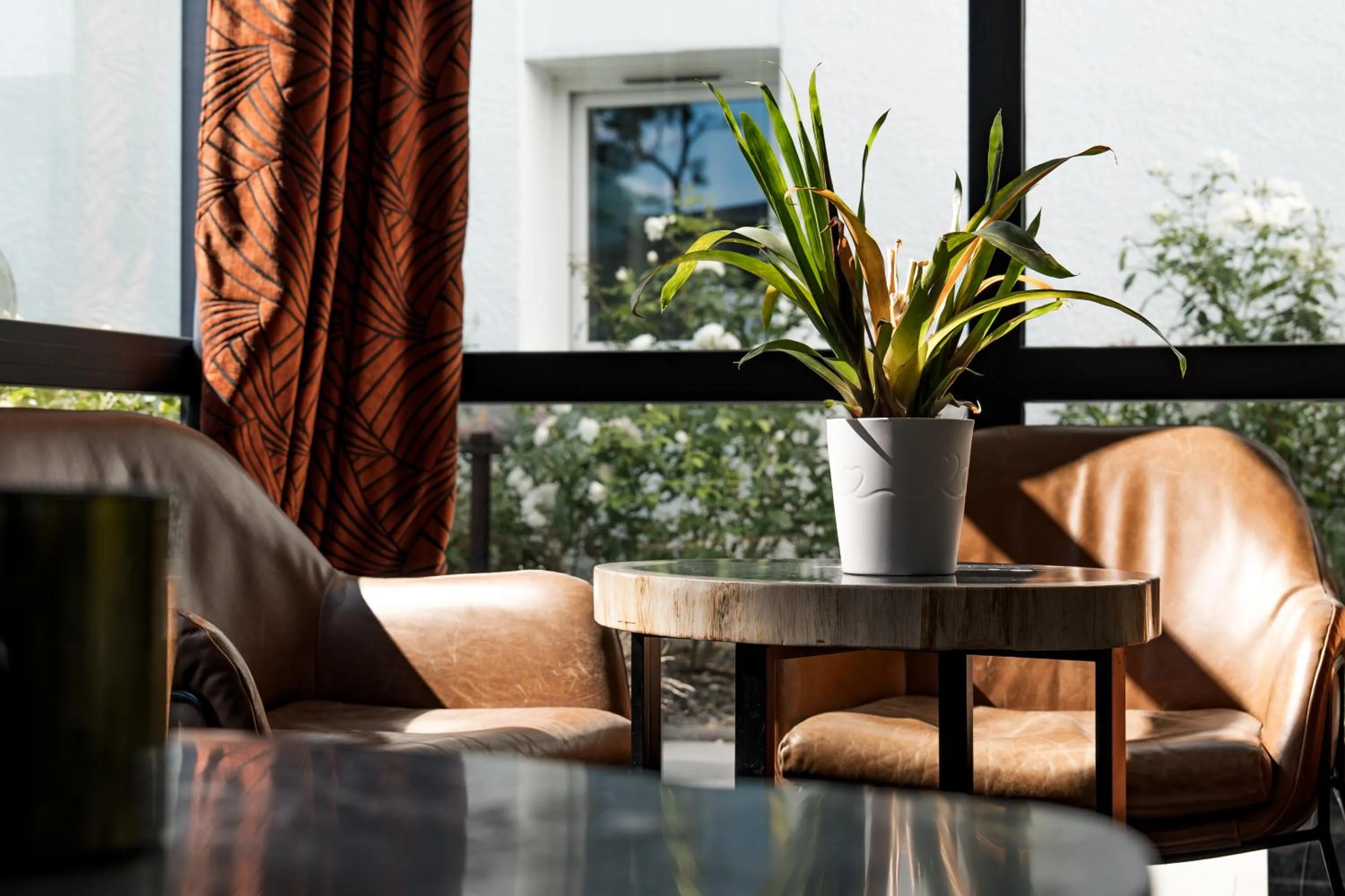 Communal lounge/ TV room in Hotel Acadie Eragny